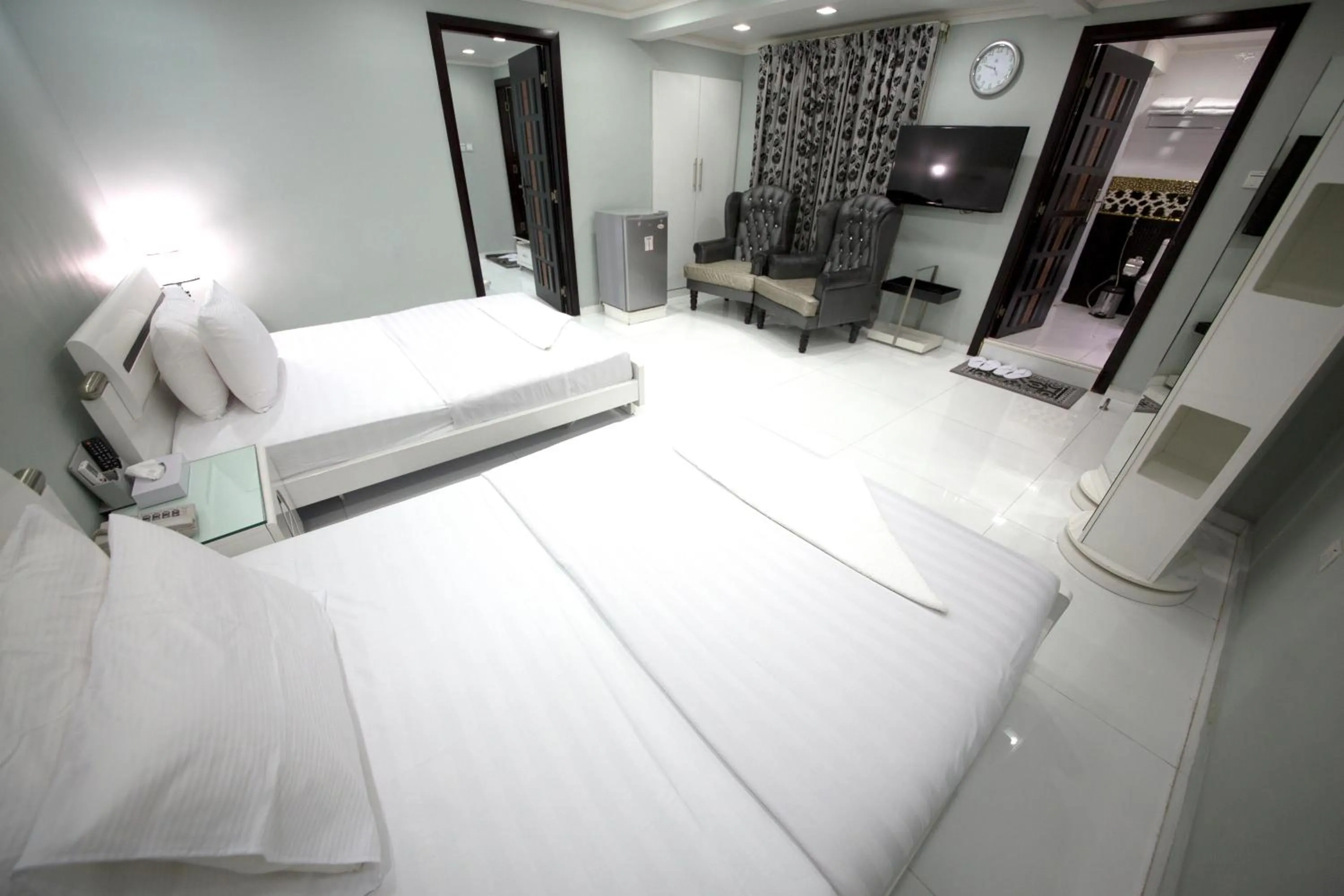 Bed in White Fort Hotel