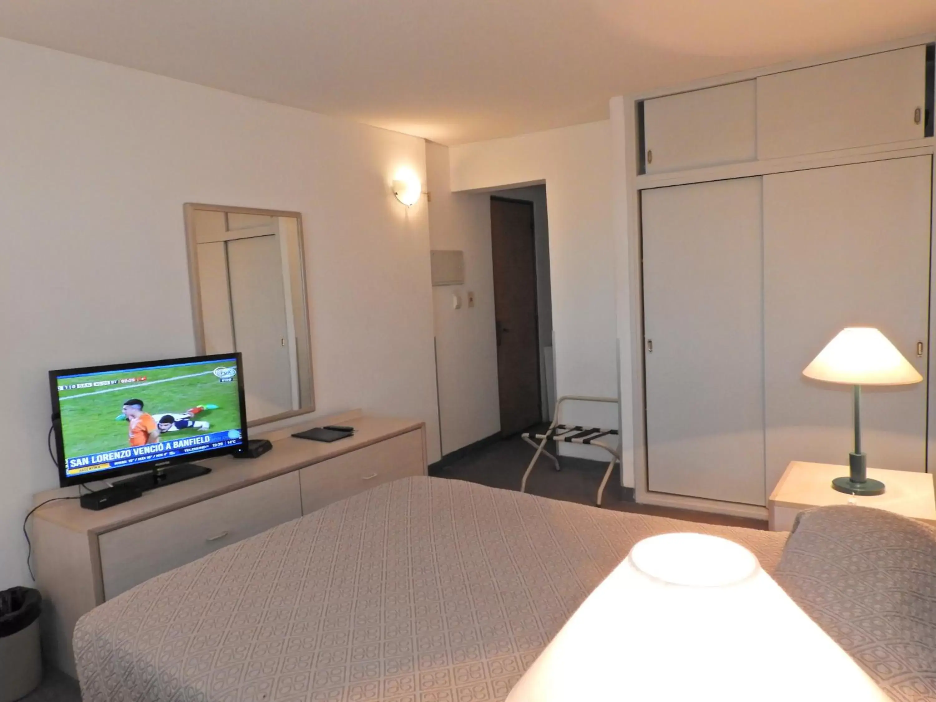 Bedroom, TV/Entertainment Center in Hotel Tres Cruces