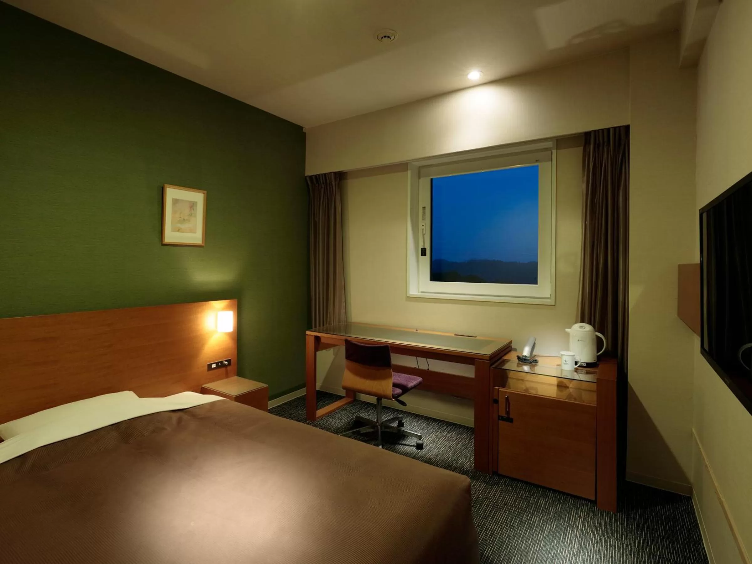 Photo of the whole room, Bed in Candeo Hotels Kameyama