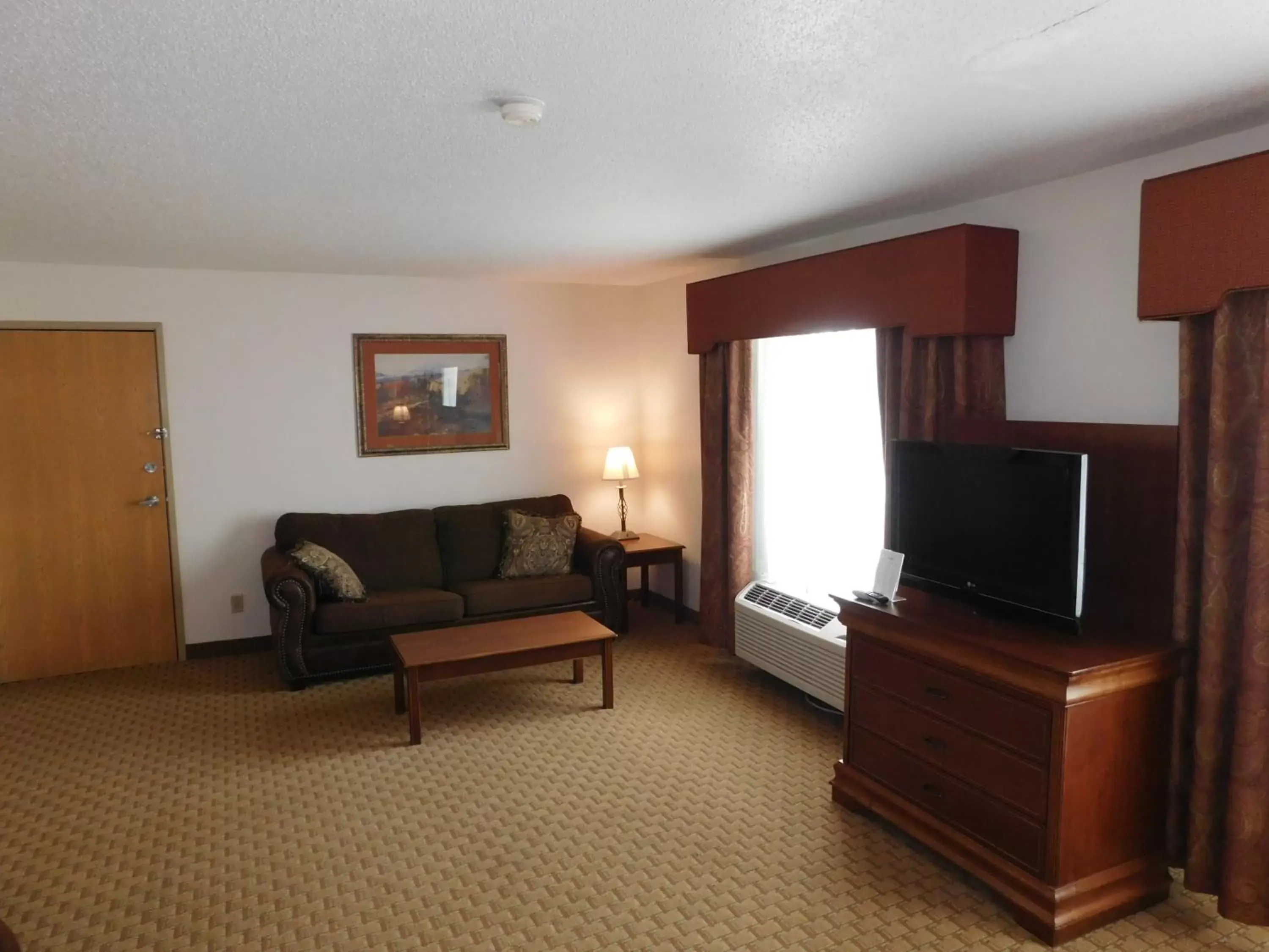 Living room, TV/Entertainment Center in Americinn by Wyndham Ogallala