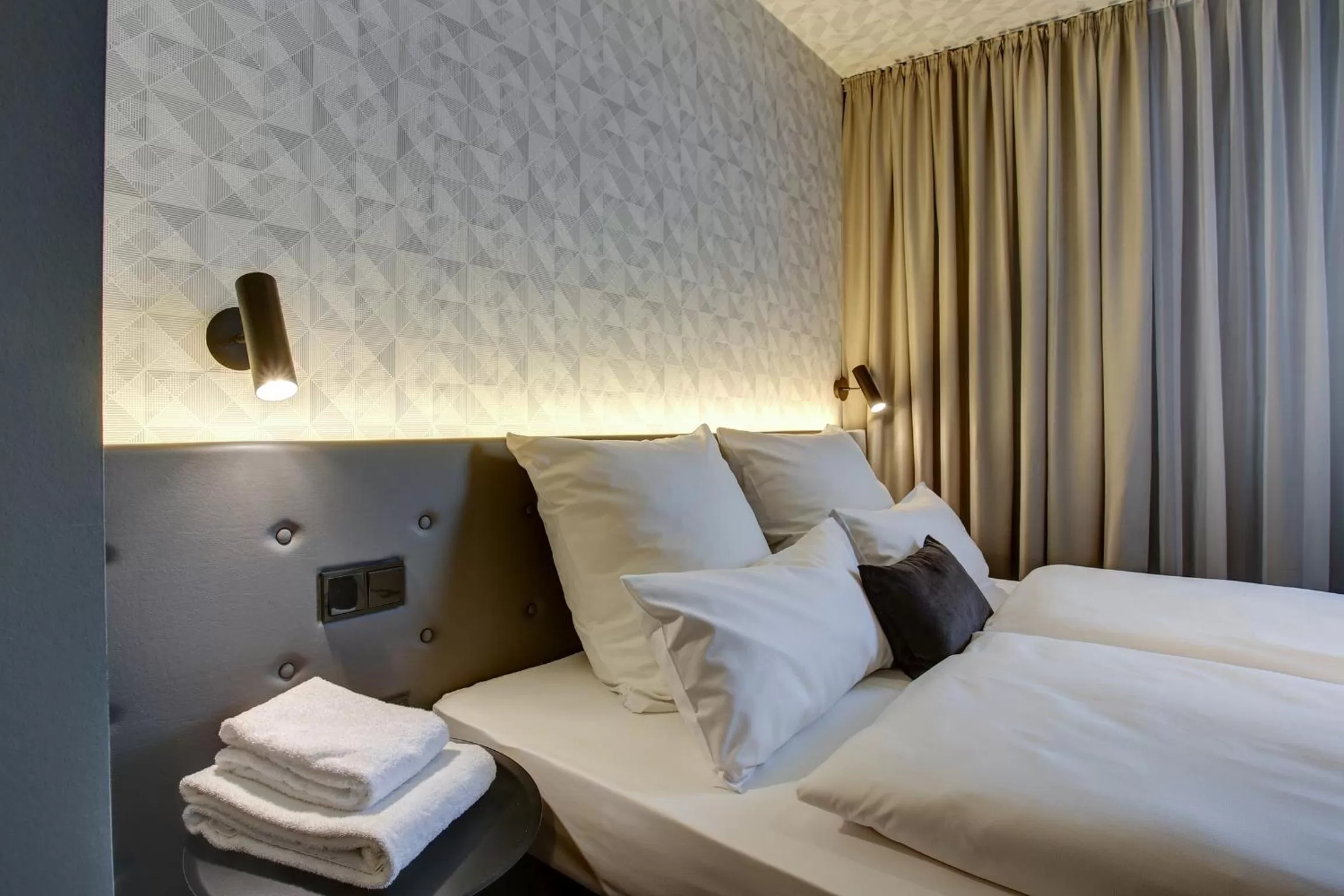 Decorative detail, Bed in Vienna House Easy by Wyndham Dortmund City