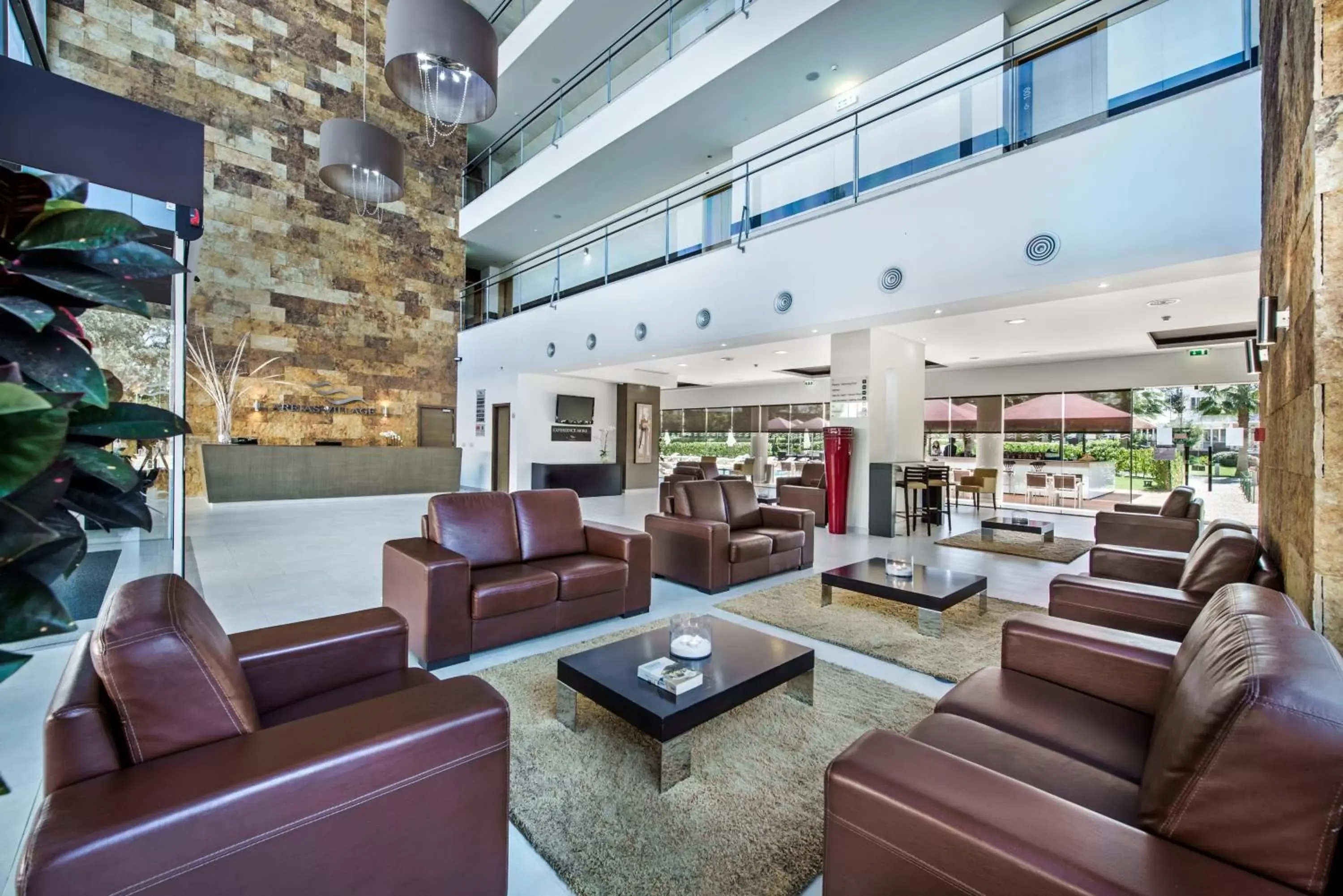 Lobby or reception in Areias Village Beach Suite Hotel