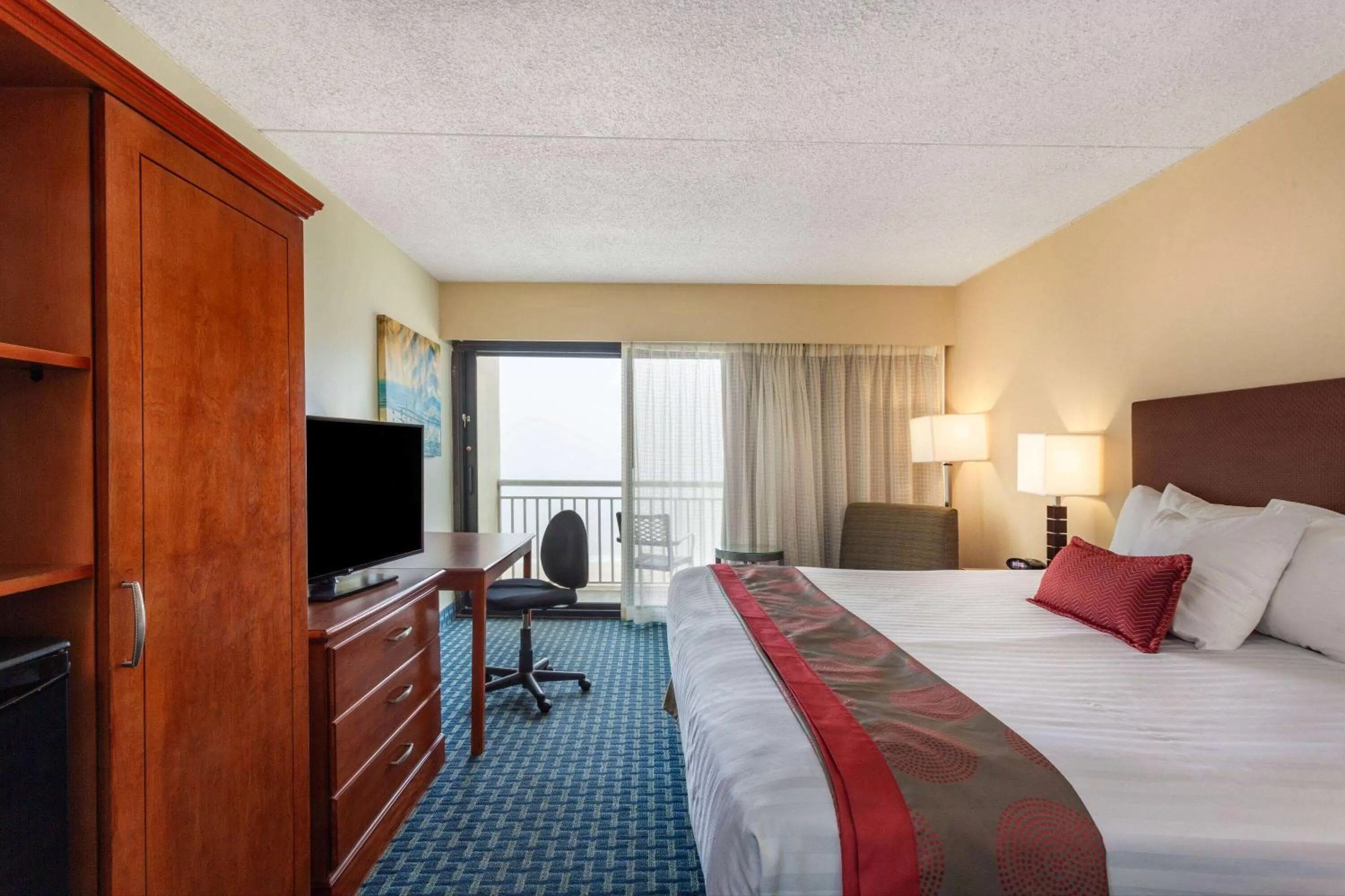 Photo of the whole room, Bed in Ramada Plaza by Wyndham Virginia Beach Oceanfront