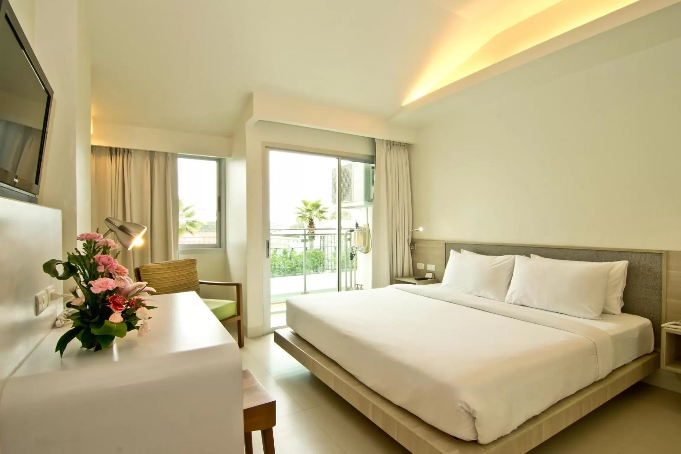 Bed in Sunshine Hotel & Residences