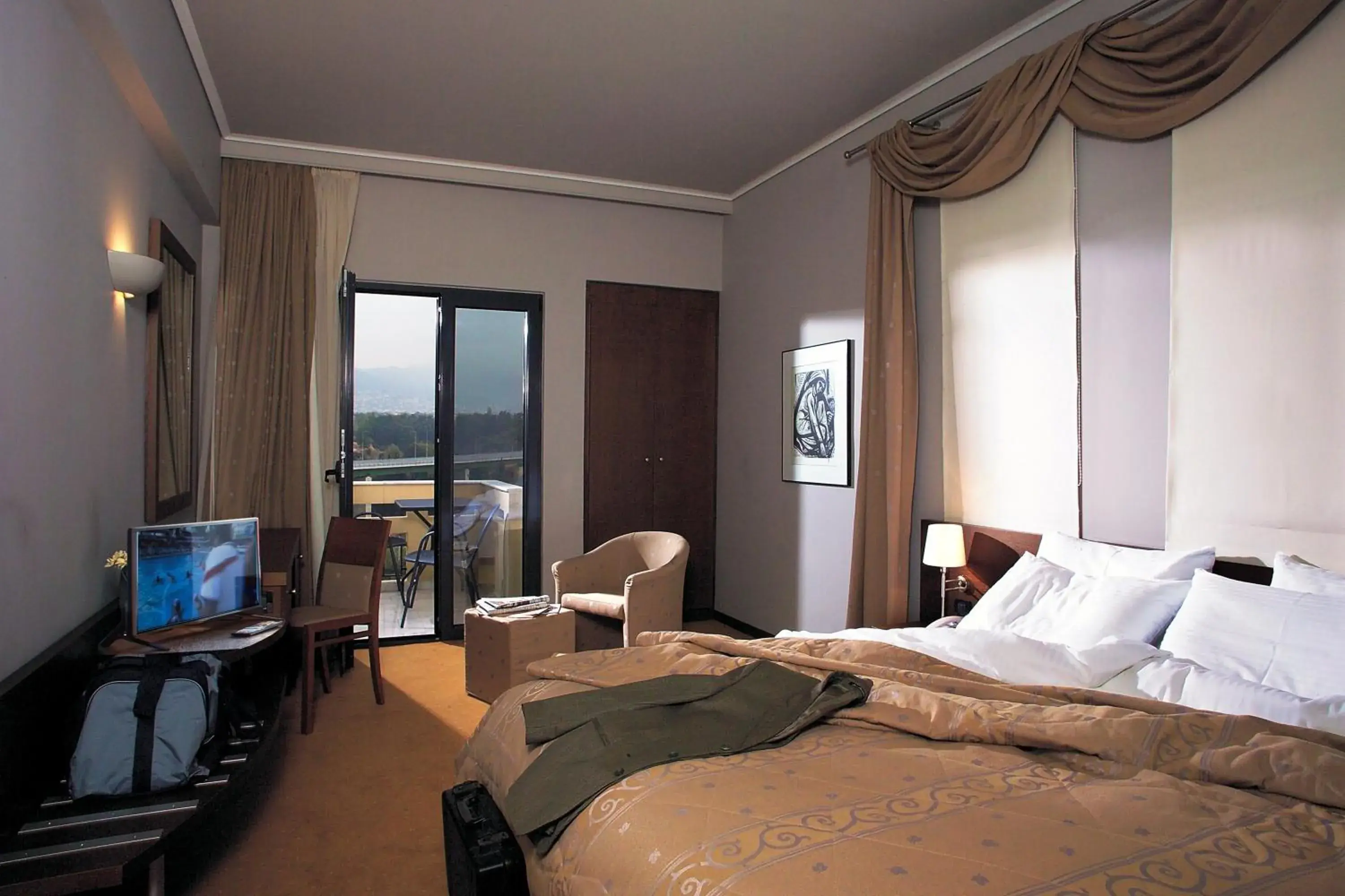 Bed in Dekelia Hotel