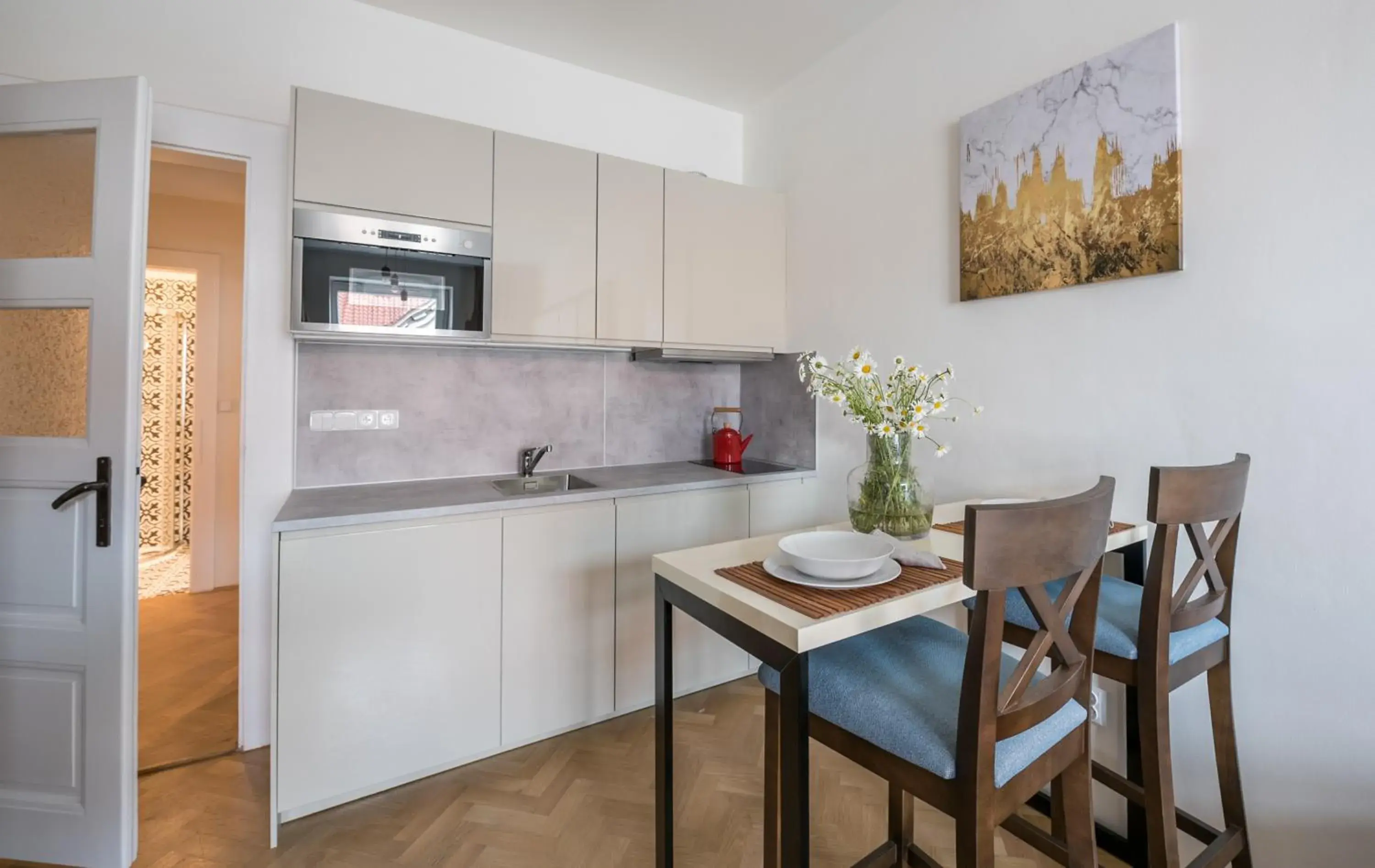 Kitchen/Kitchenette in Letna Garden Suites