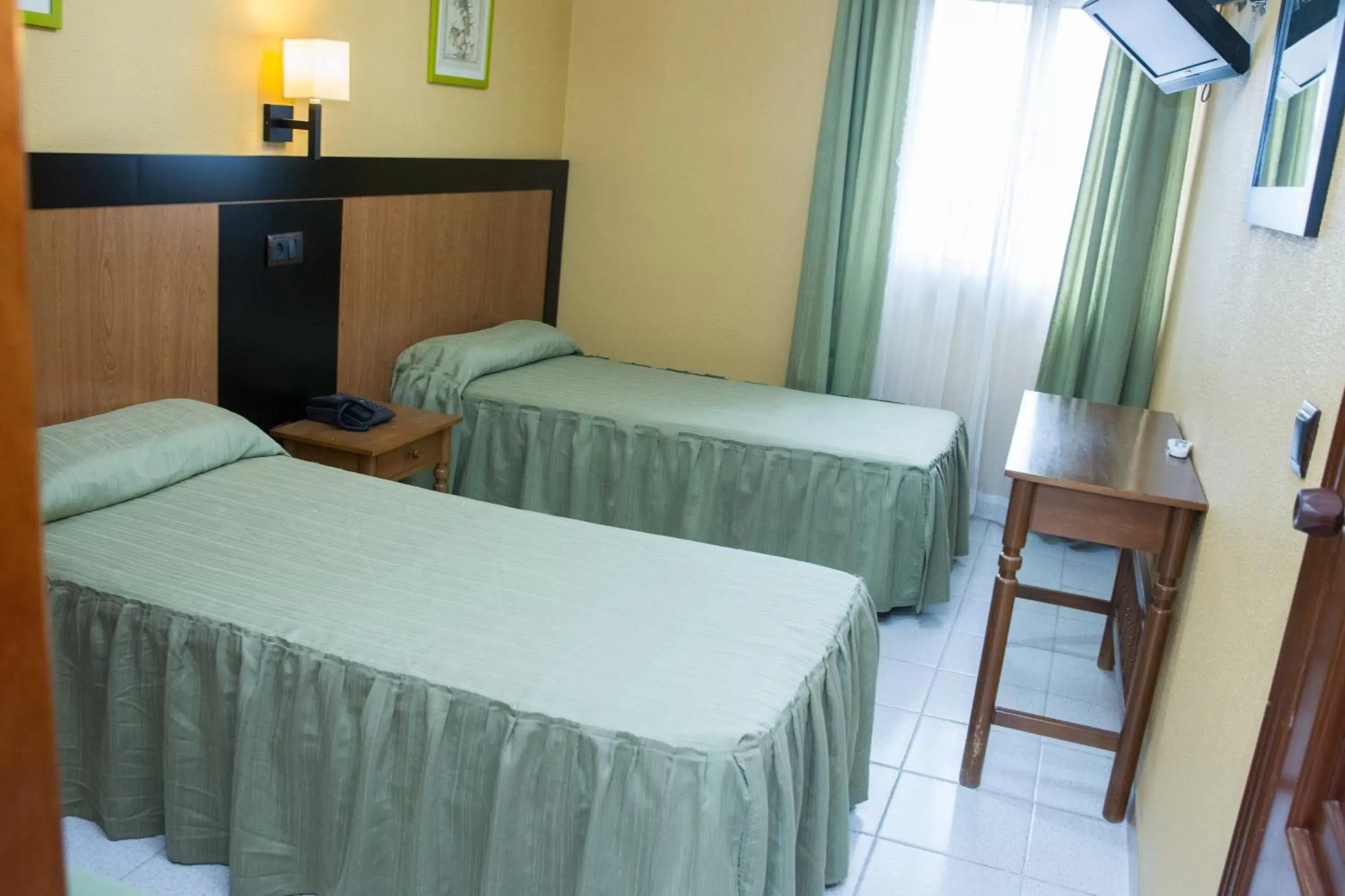 Photo of the whole room, Bed in Hostal La Palmera