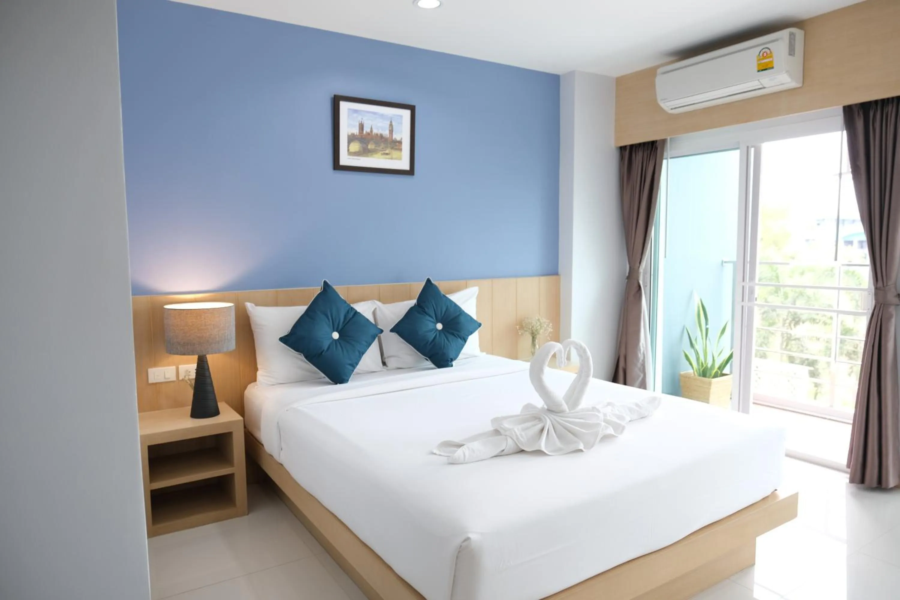 Bed in Charisma Residence