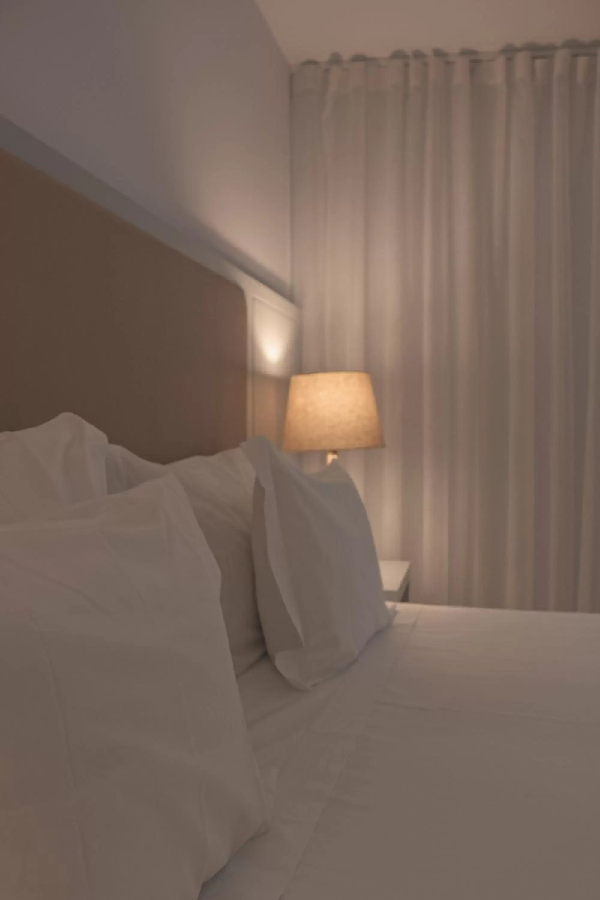 Bed in Burgus Tribute & Design Hotel