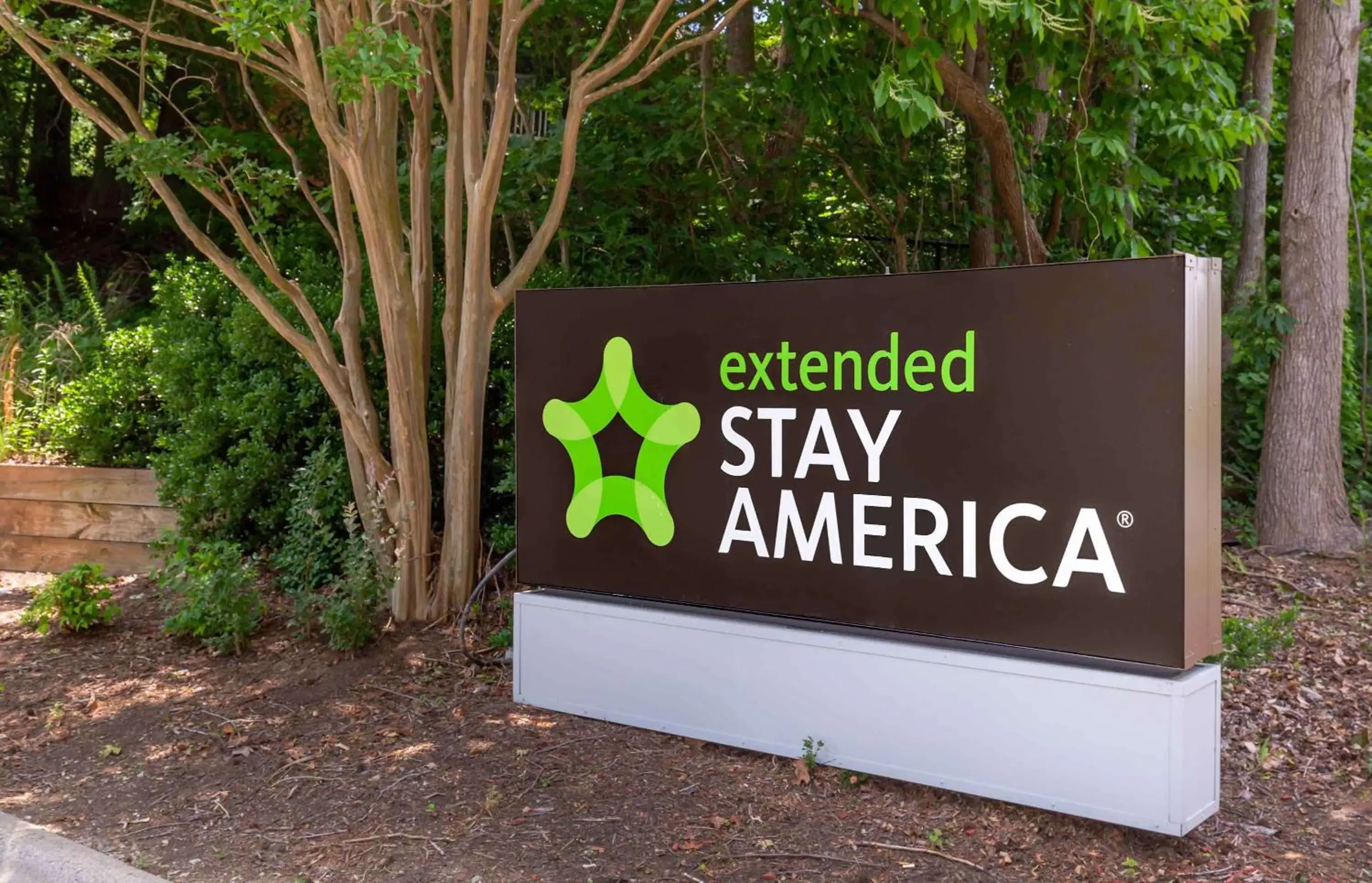 Property building, Property Logo/Sign in Extended Stay America Suites - Greensboro - Wendover Ave - Big Tree Way