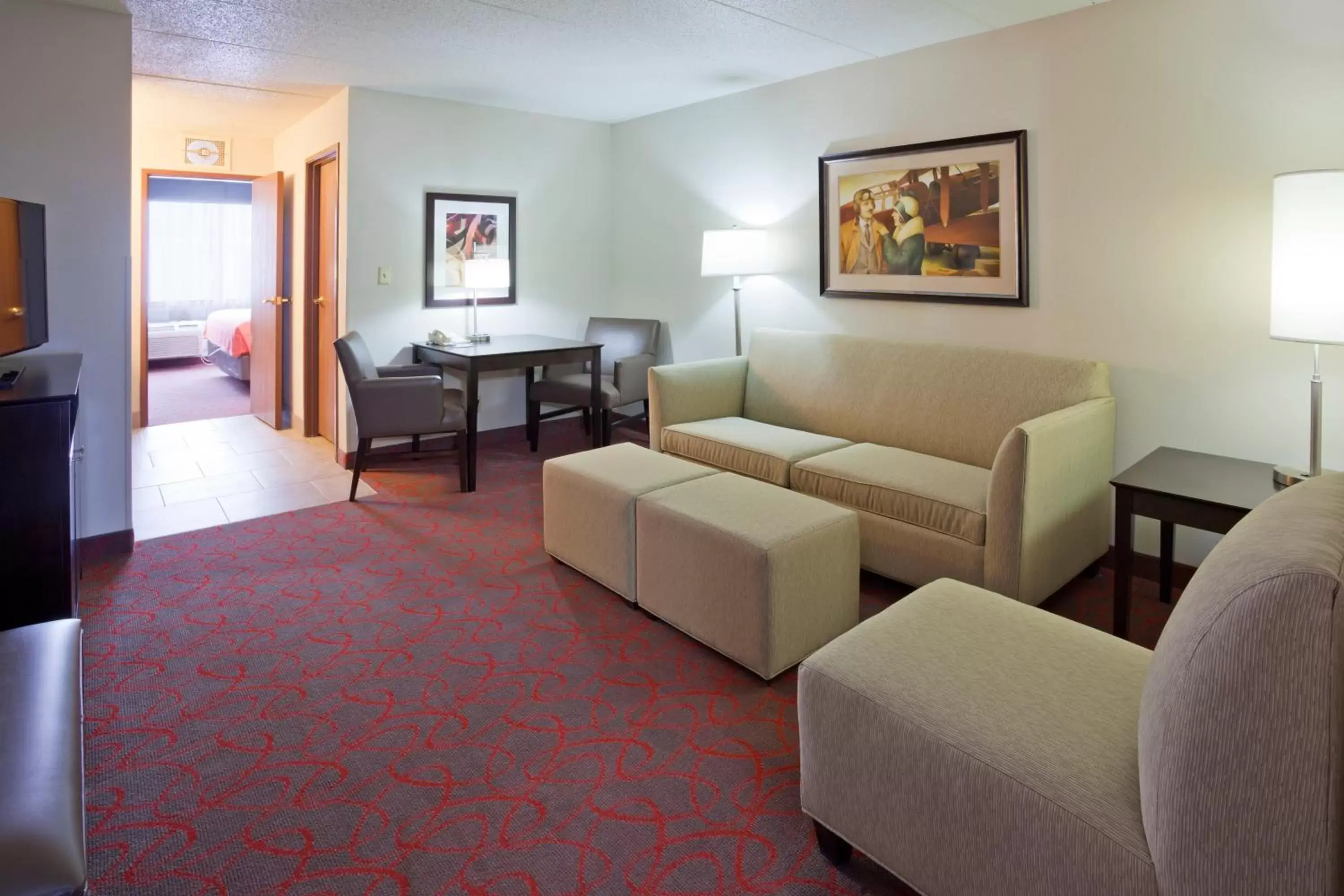 Photo of the whole room, Seating Area in Holiday Inn Express & Suites Bloomington West, an IHG Hotel