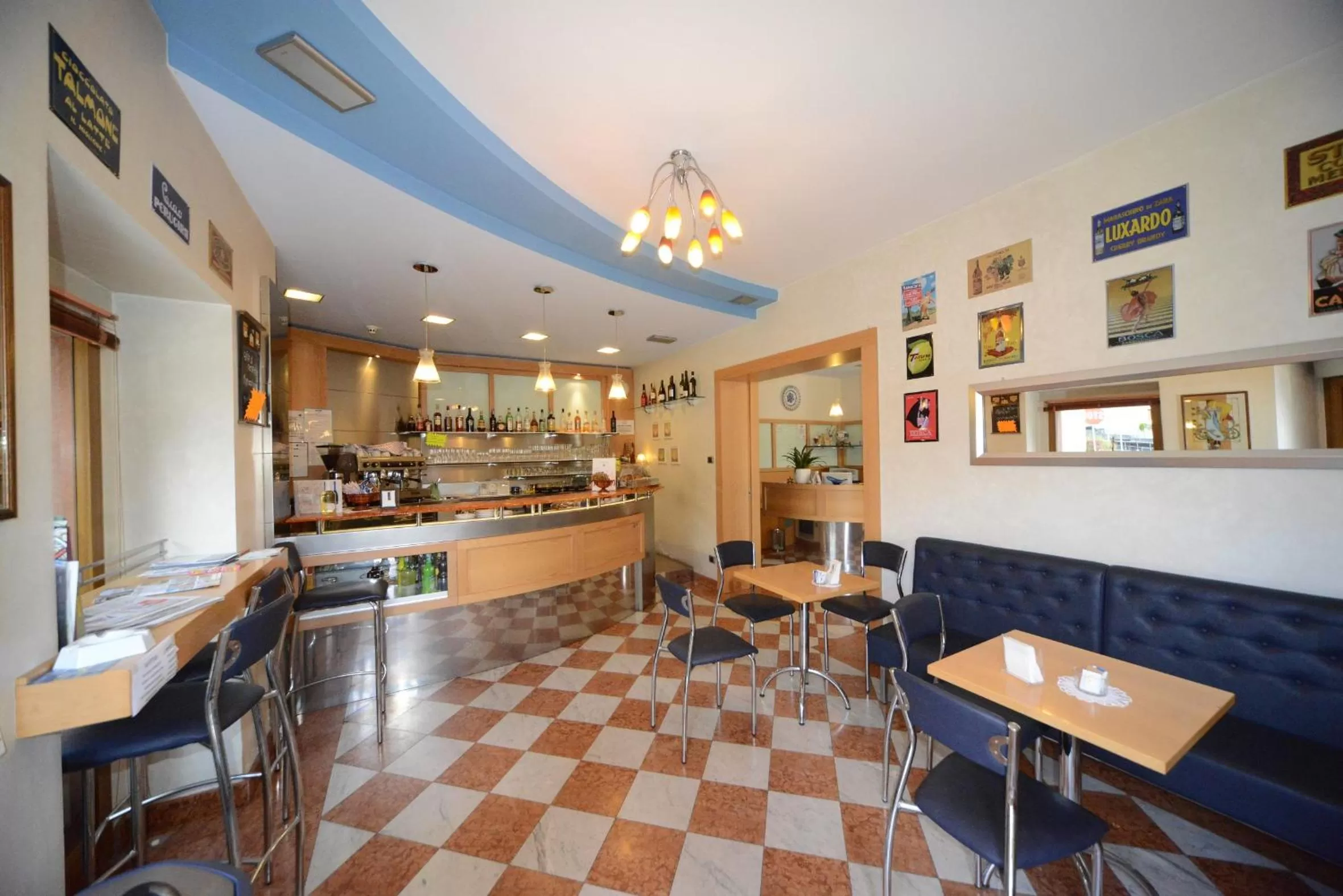 Communal lounge/ TV room in Hotel Residence Sant'Anna