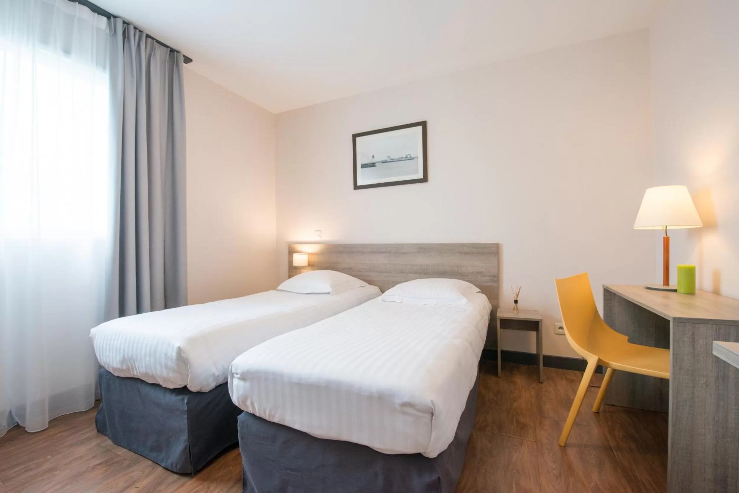 Bed in Comfort Aparthotel Saint-Nazaire Les Portes de l Ocean