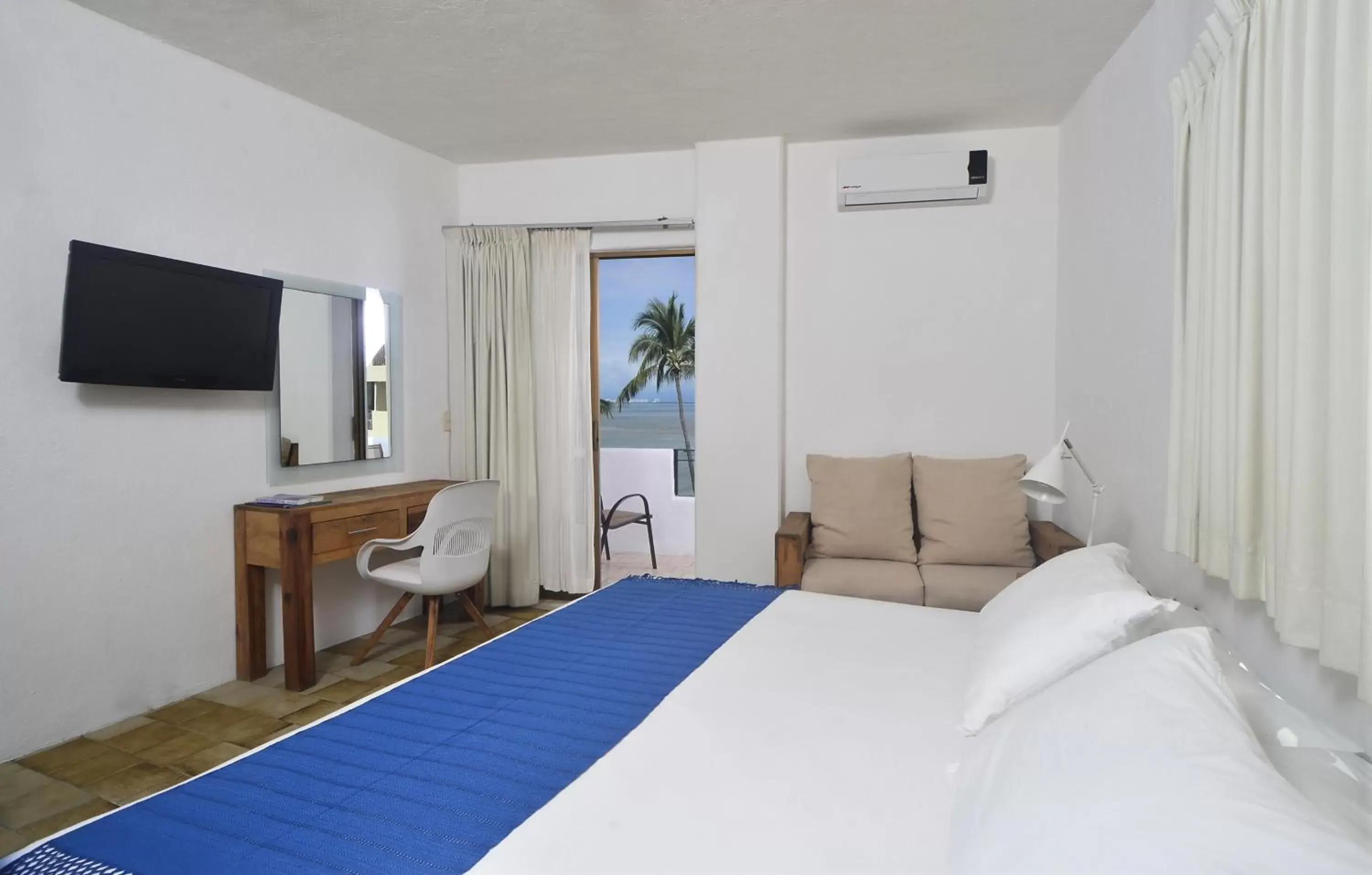 Photo of the whole room, Bed in Emperador Vallarta Beachfront Hotel and Suites