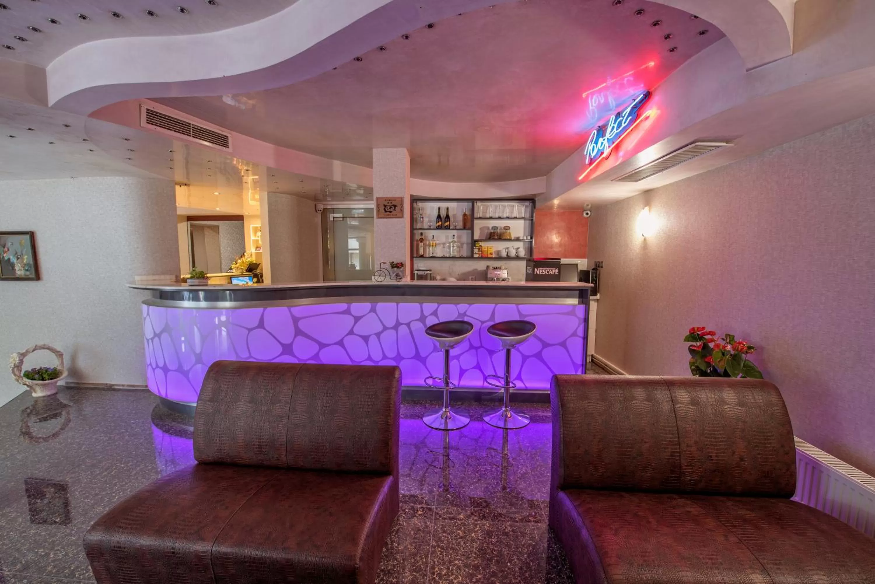 Communal lounge/ TV room in Hotel Perfect