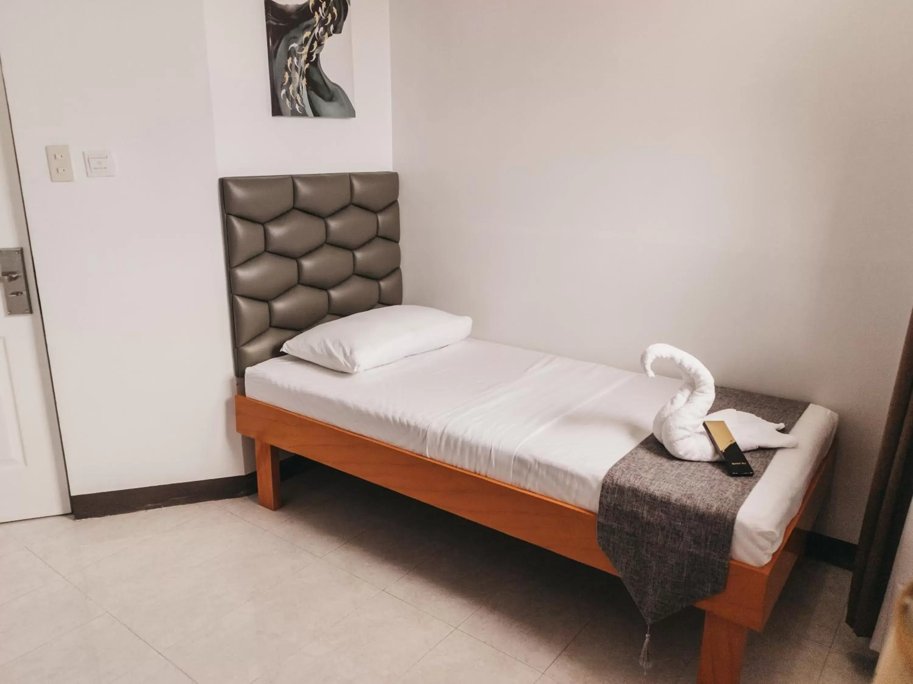 Bed in La Choeben Suites Bed in La Choeben Suites