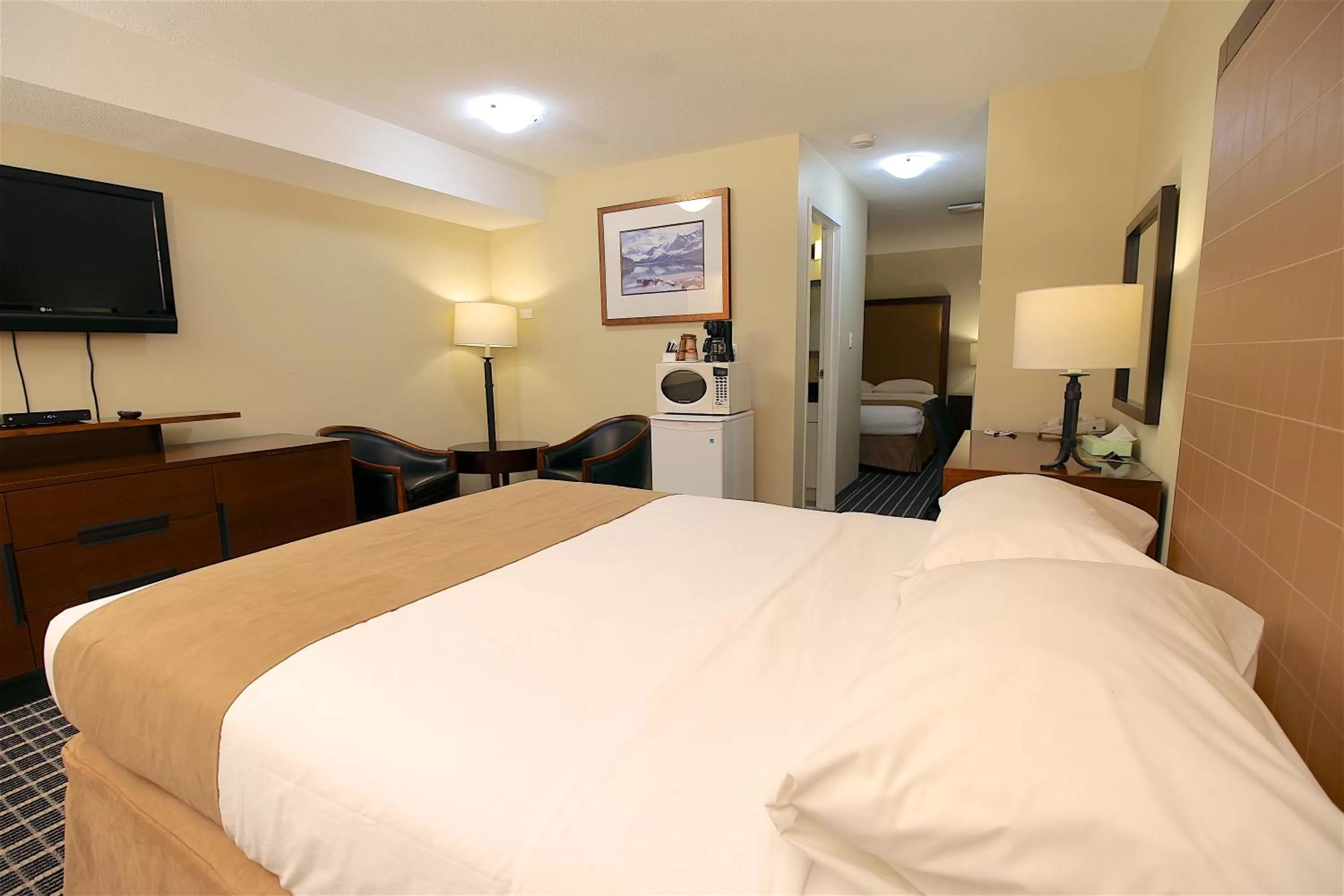 Bed in Medicine Hat Suites