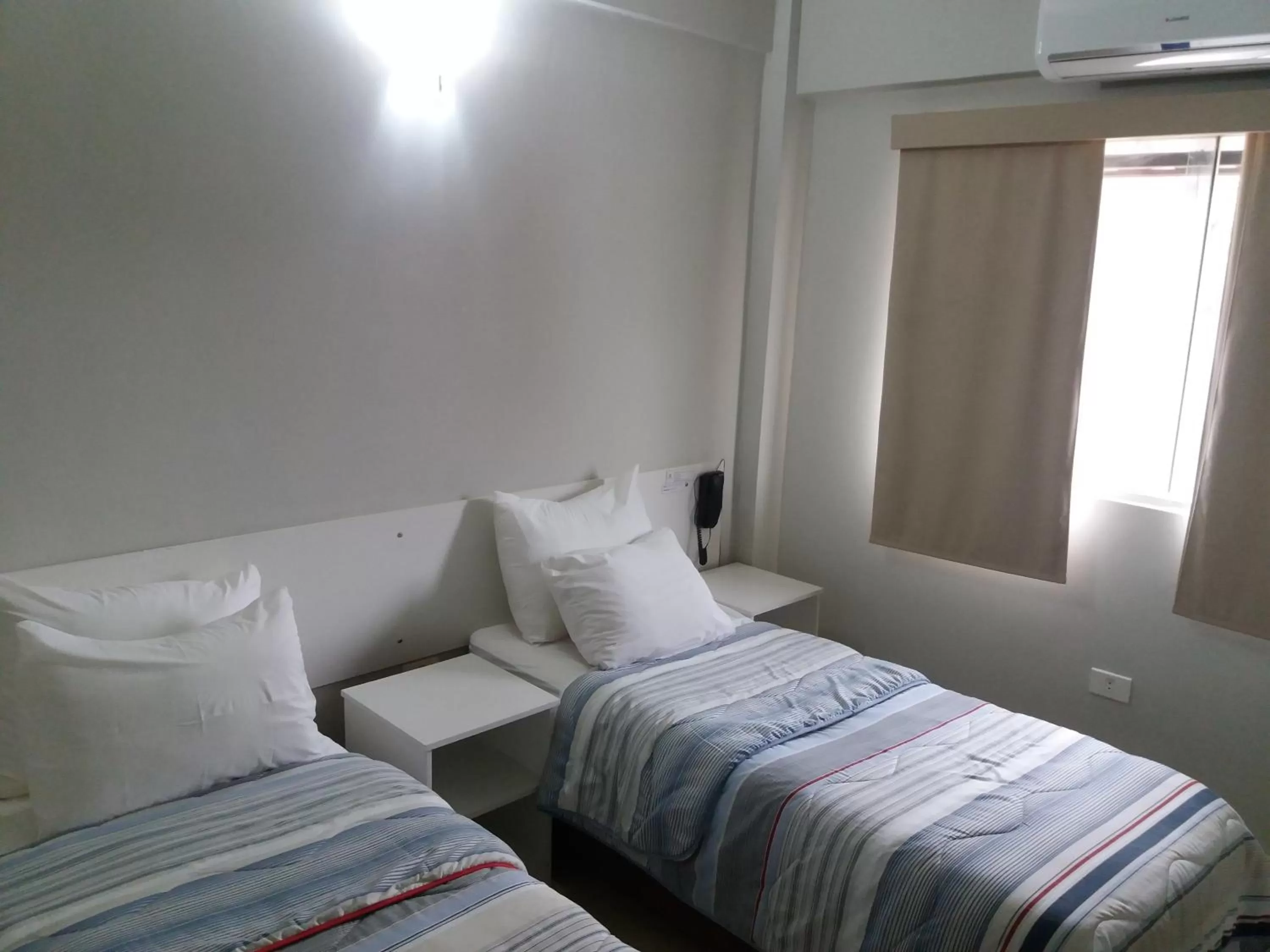 Bed in Madame Lynch Hotel Asuncion