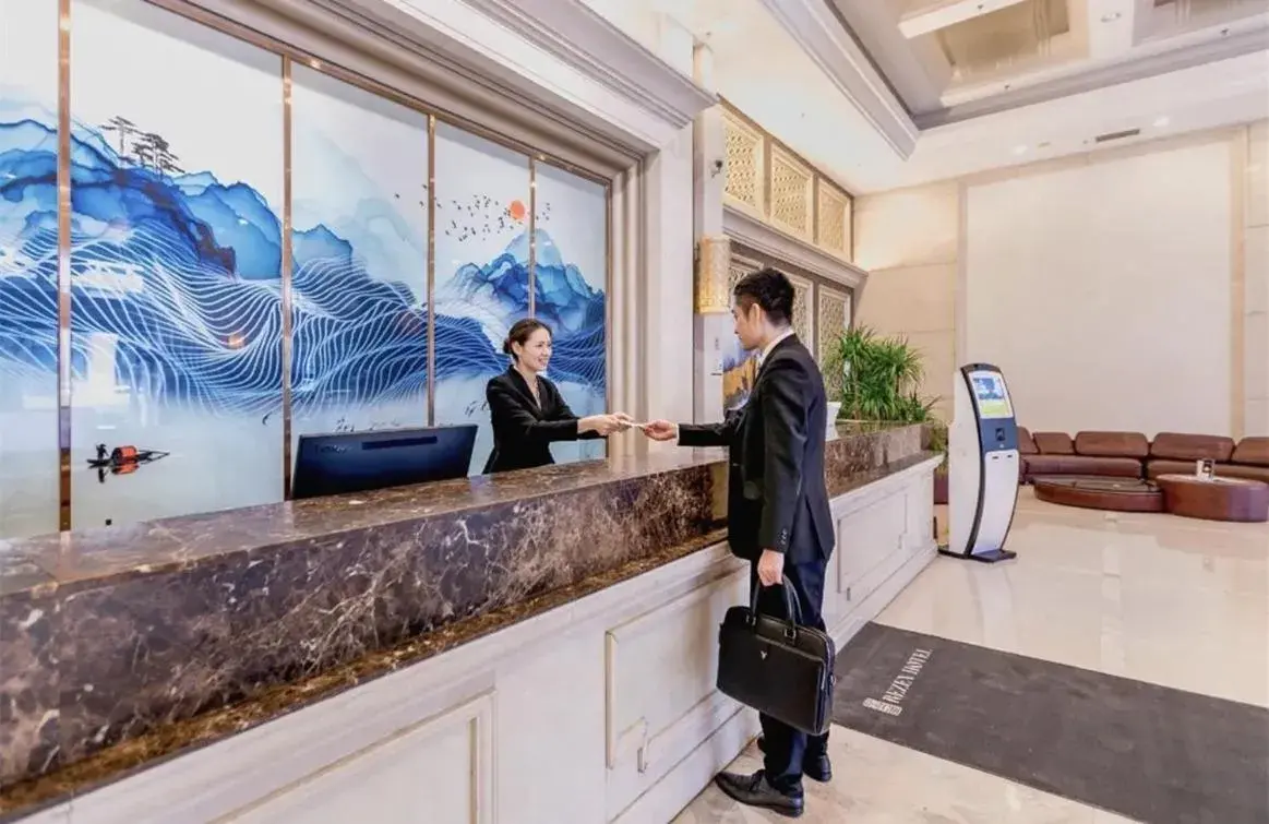 Lobby or reception in Guangzhou Nuomo International Hotel