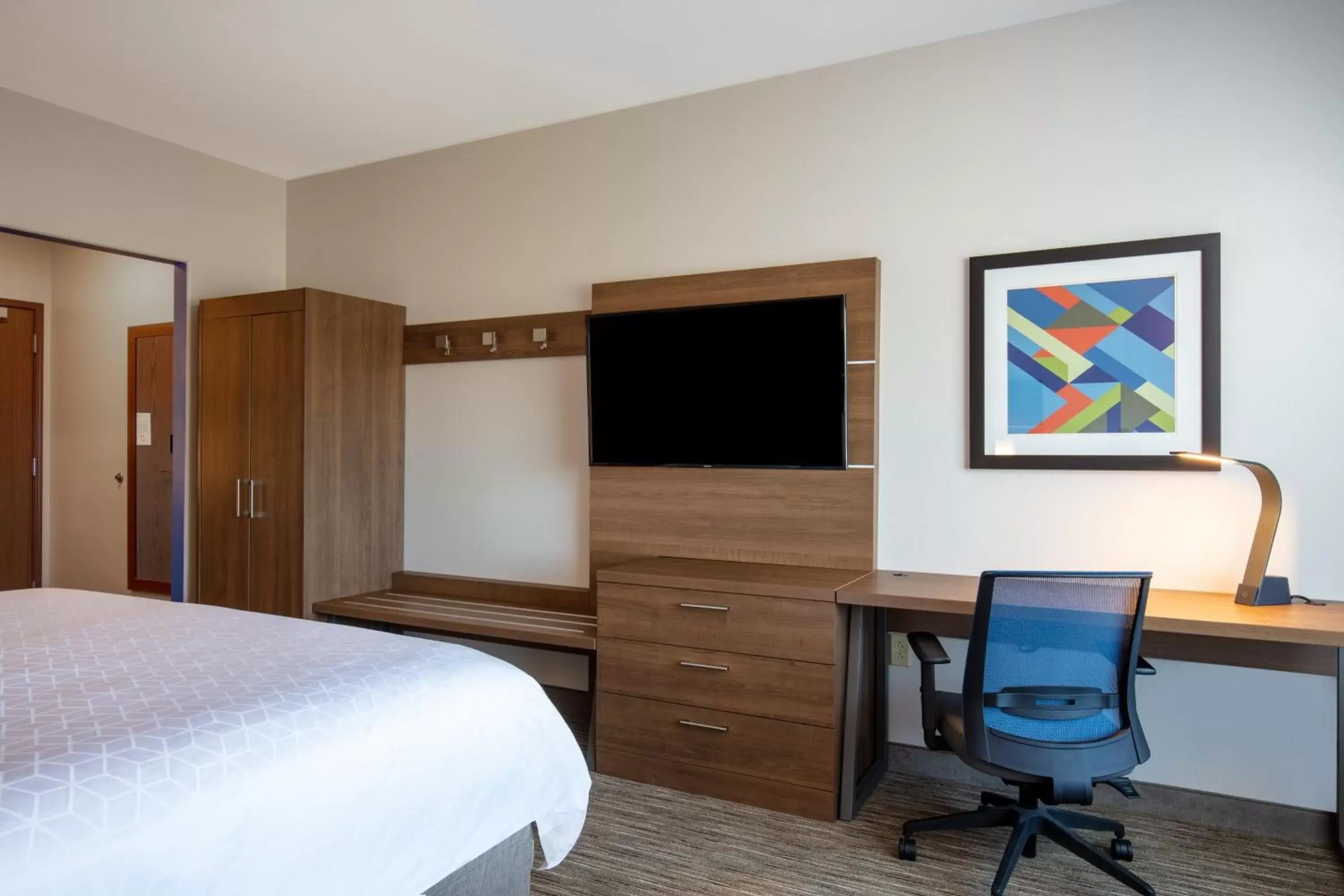 Photo of the whole room, TV/Entertainment Center in Holiday Inn Express & Suites - Beloit, an IHG Hotel