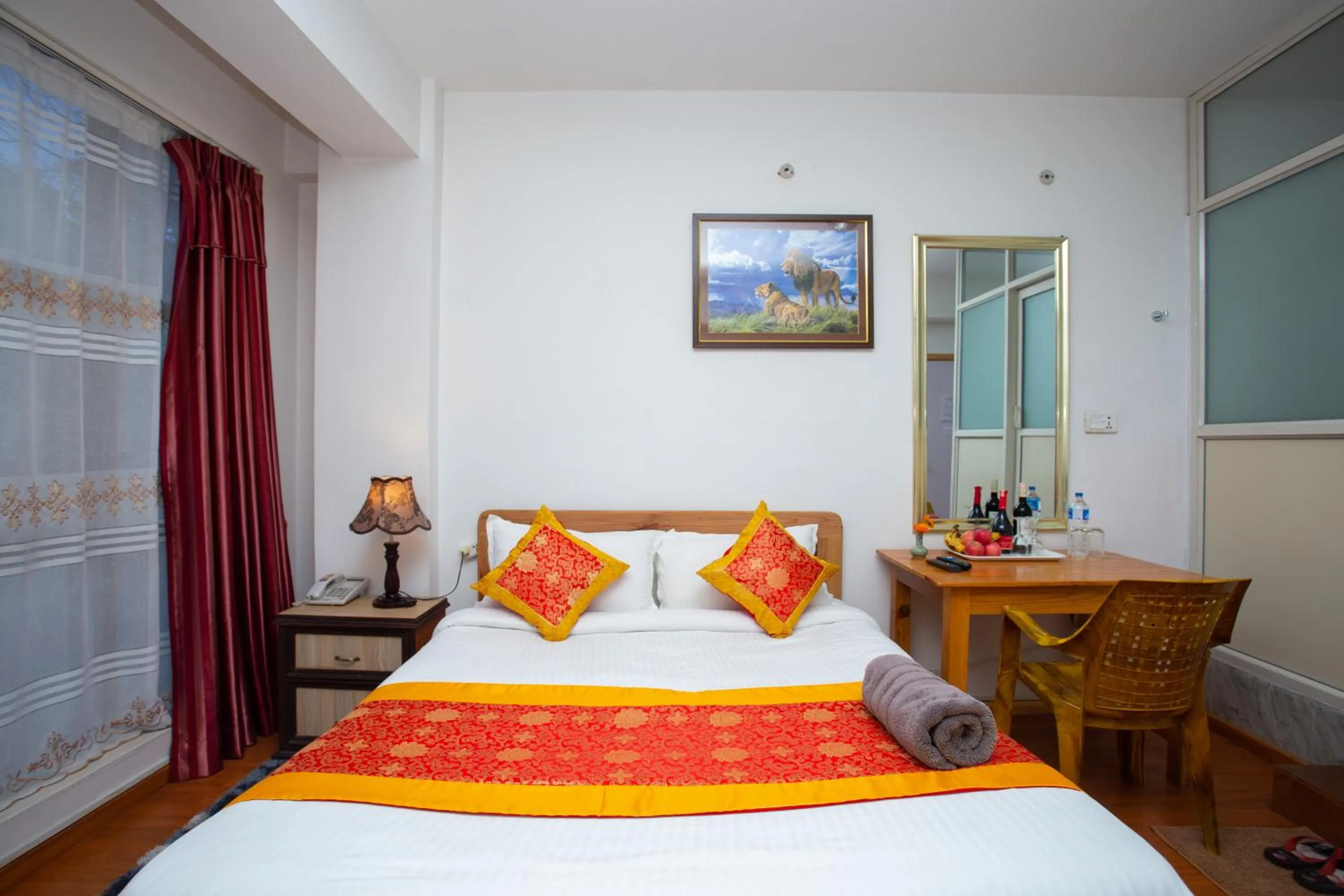 Bed in The Boudha Inn