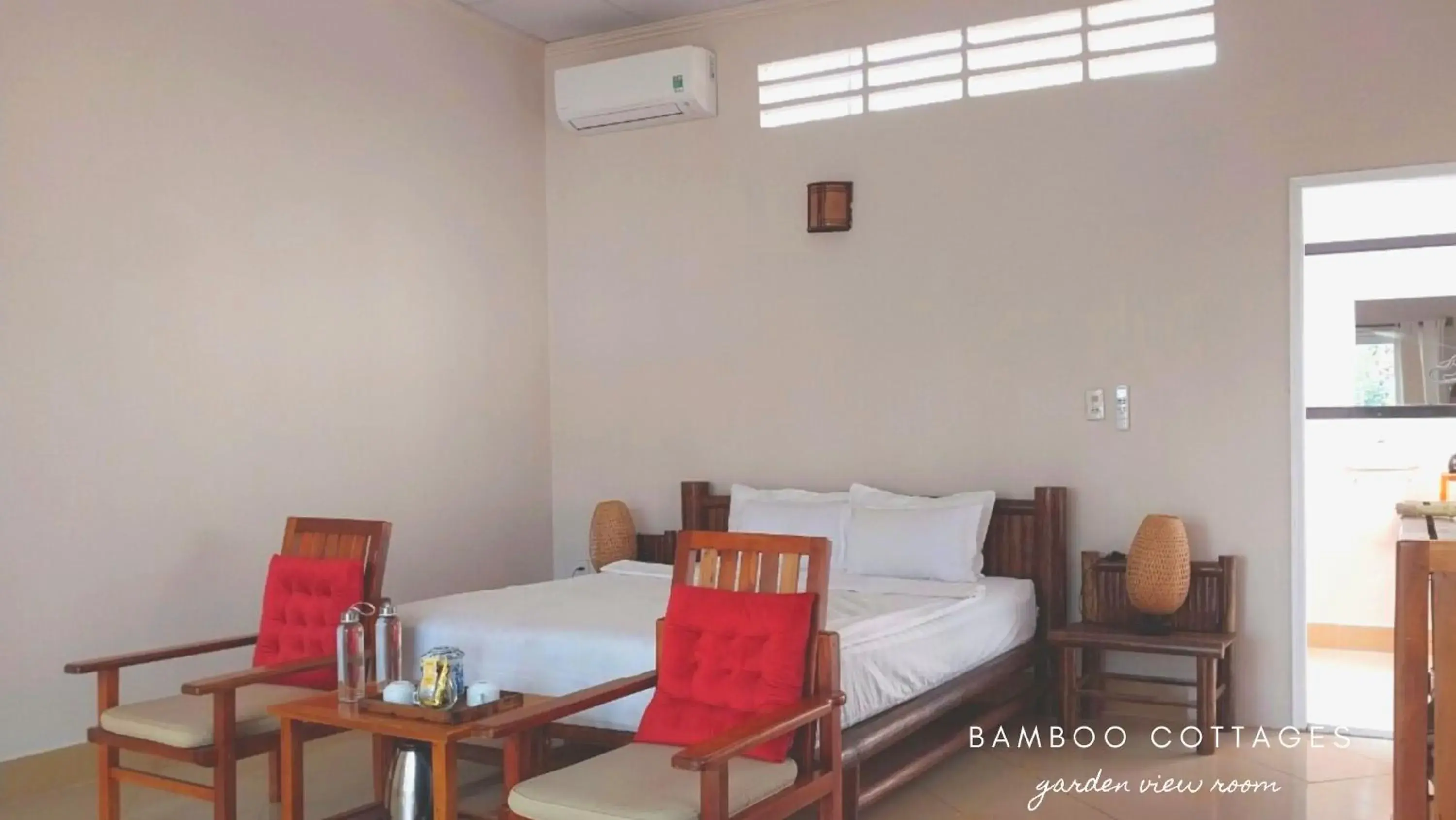 Bedroom, Seating Area in Bamboo Cottages