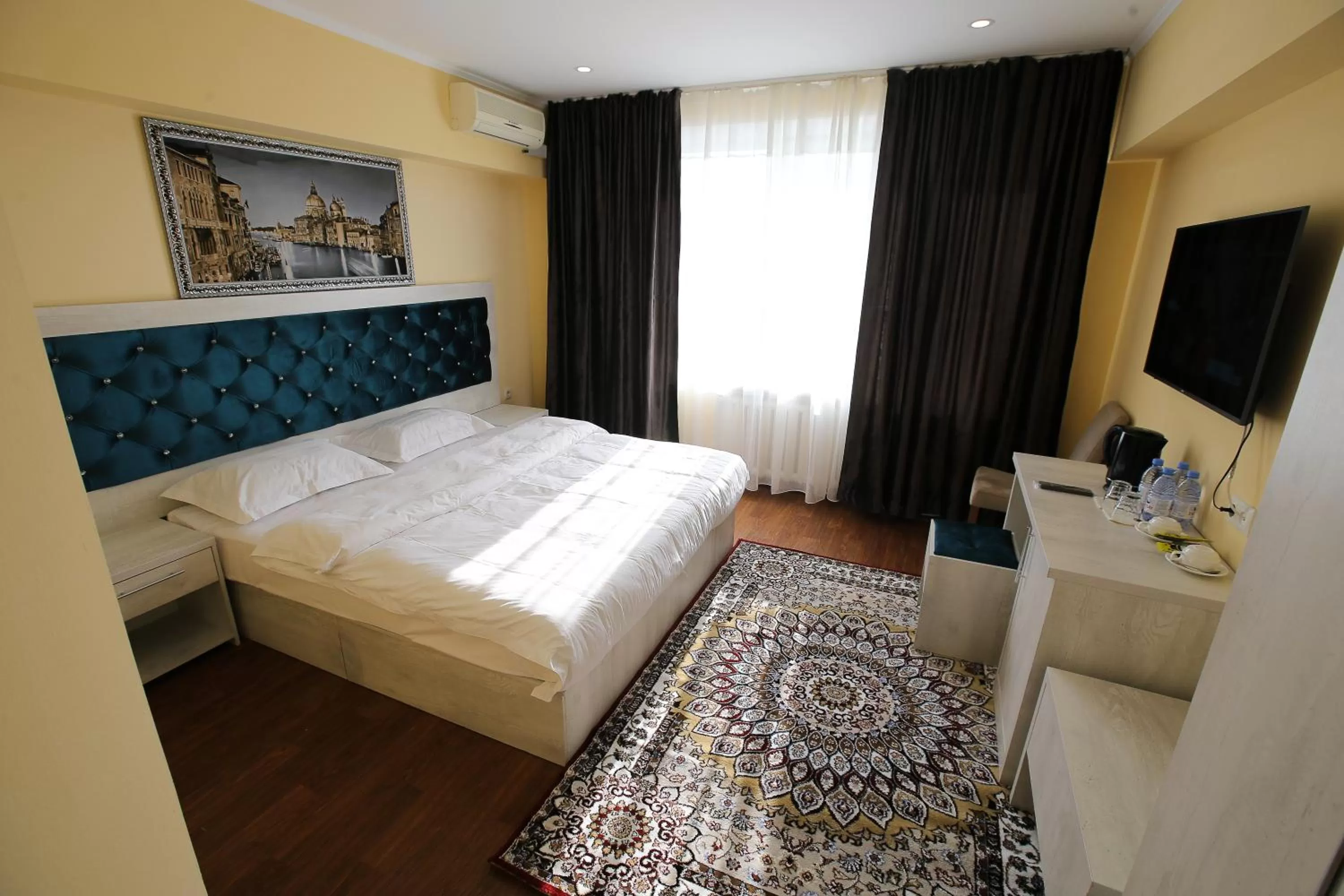 Bed in Altai Business Hotel