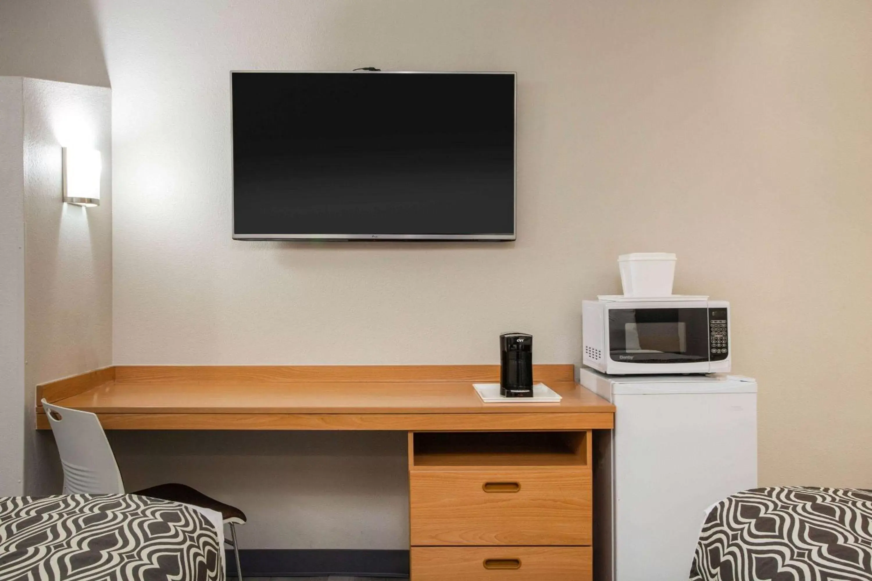 Photo of the whole room, TV/Entertainment Center in Microtel Inn & Suites by Wyndham Southern Pines Pinehurst