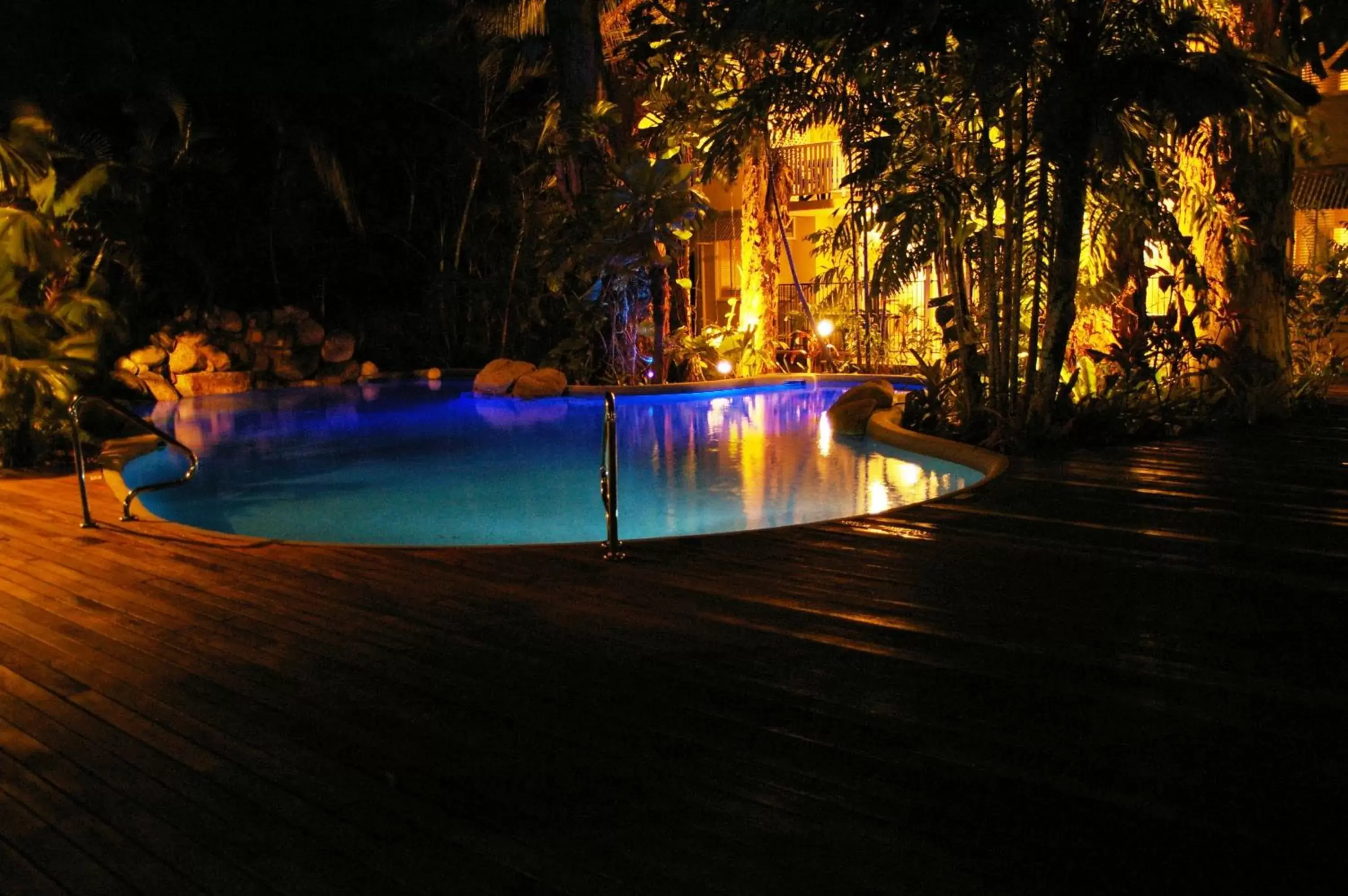 Night, Swimming Pool in Palm Cove Tropic Apartments