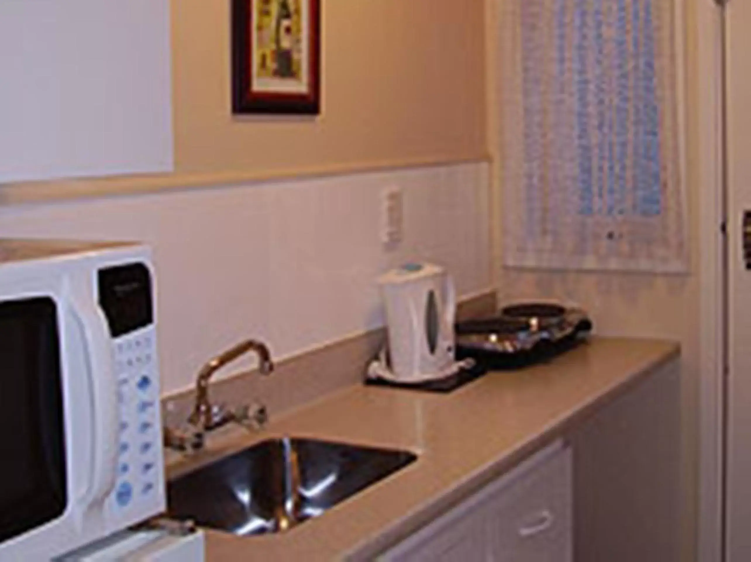 Coffee/tea facilities, Kitchen/Kitchenette in Merivale Court Motel & Apartments