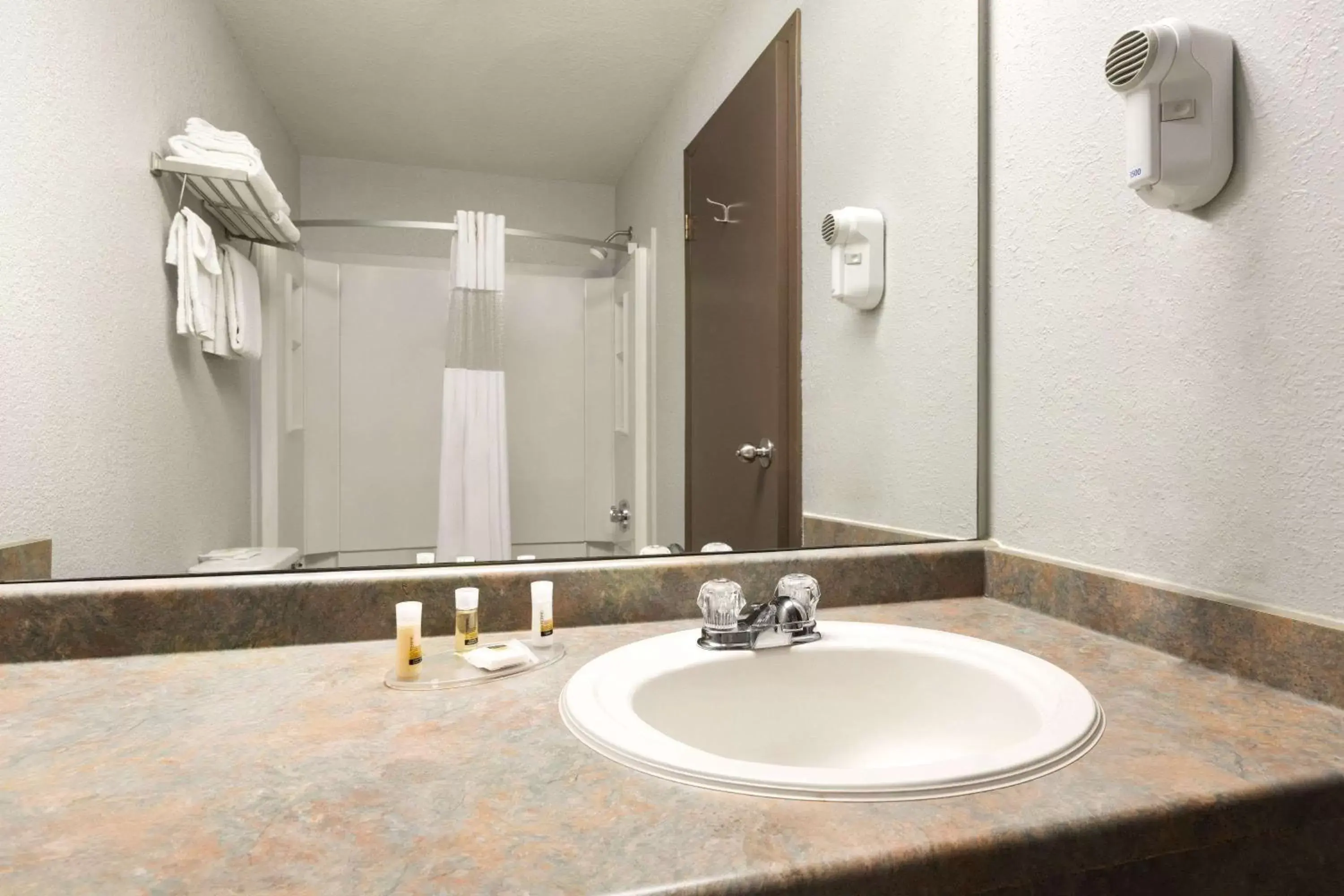 Photo of the whole room, Bathroom in Days Inn by Wyndham High Prairie