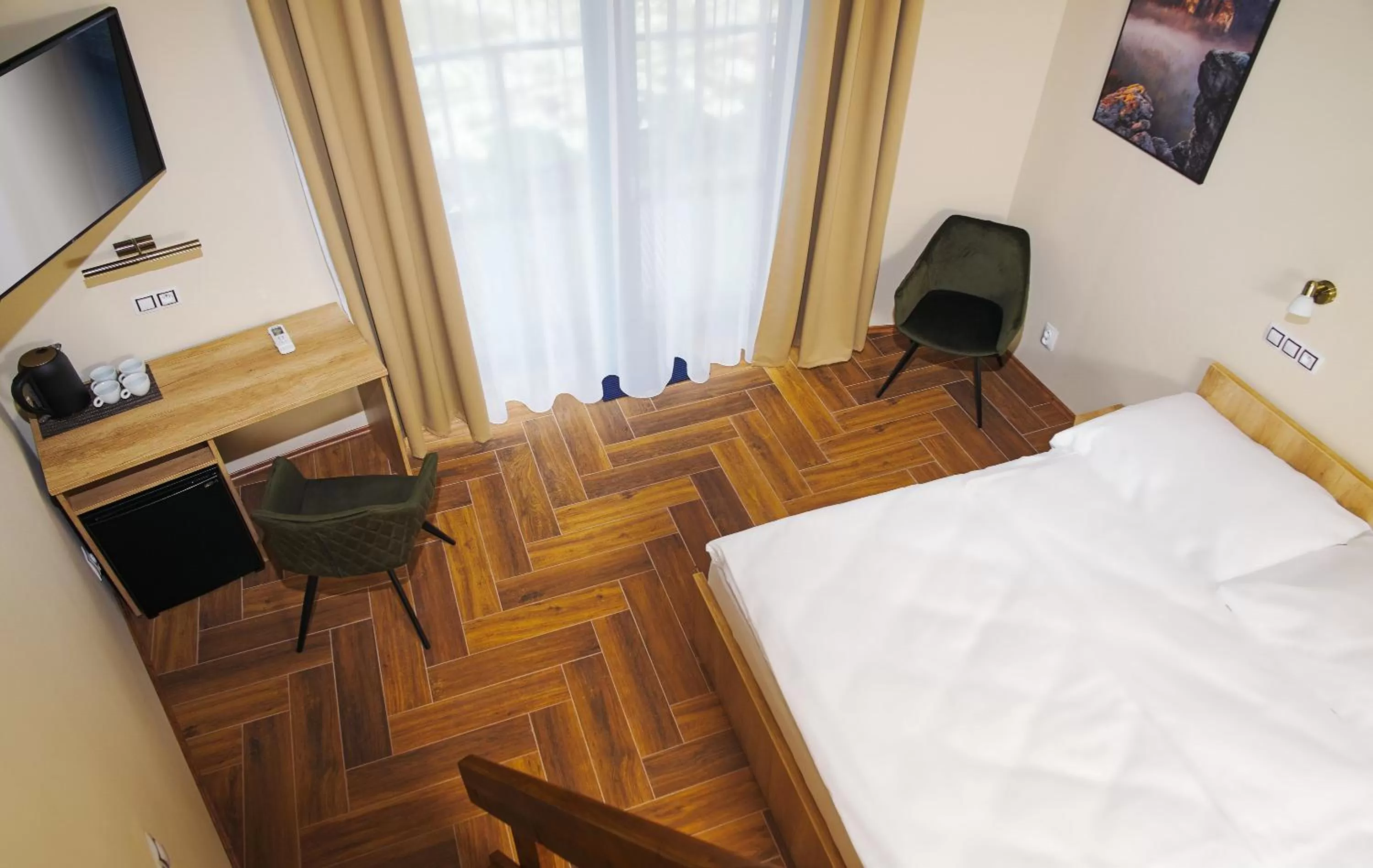 TV/Entertainment Center in Hotel Dymník