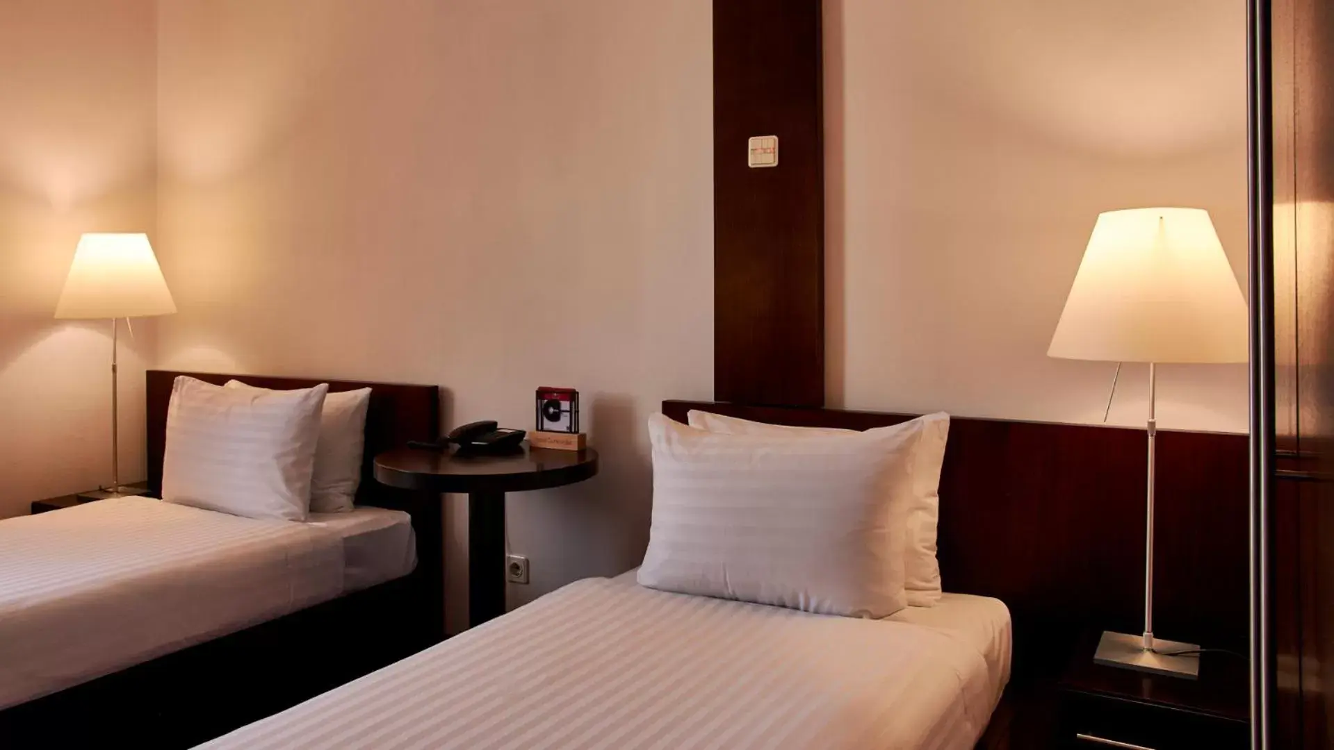 Bed in Hotel Concordia
