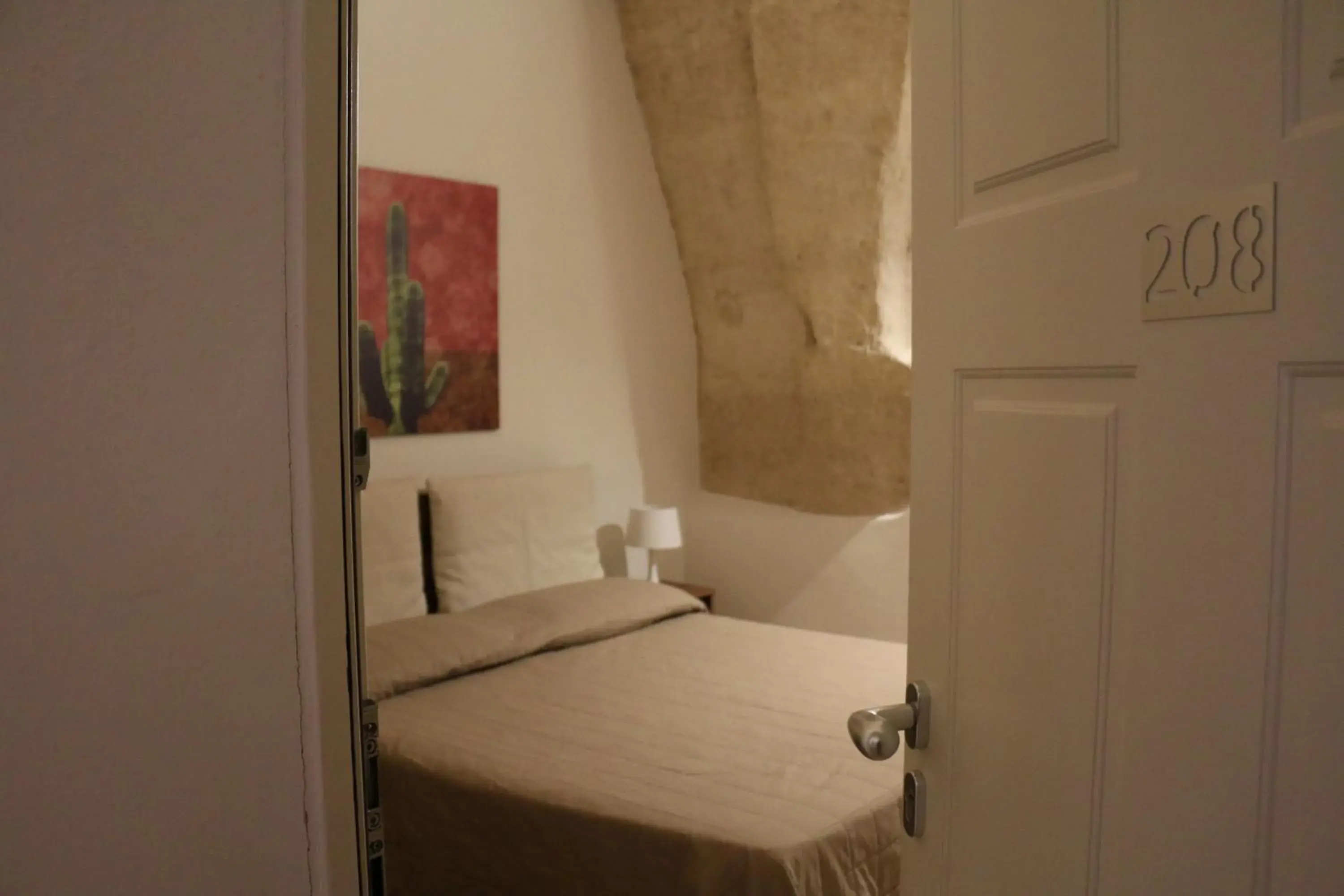 Bed in Albergo Del Sedile