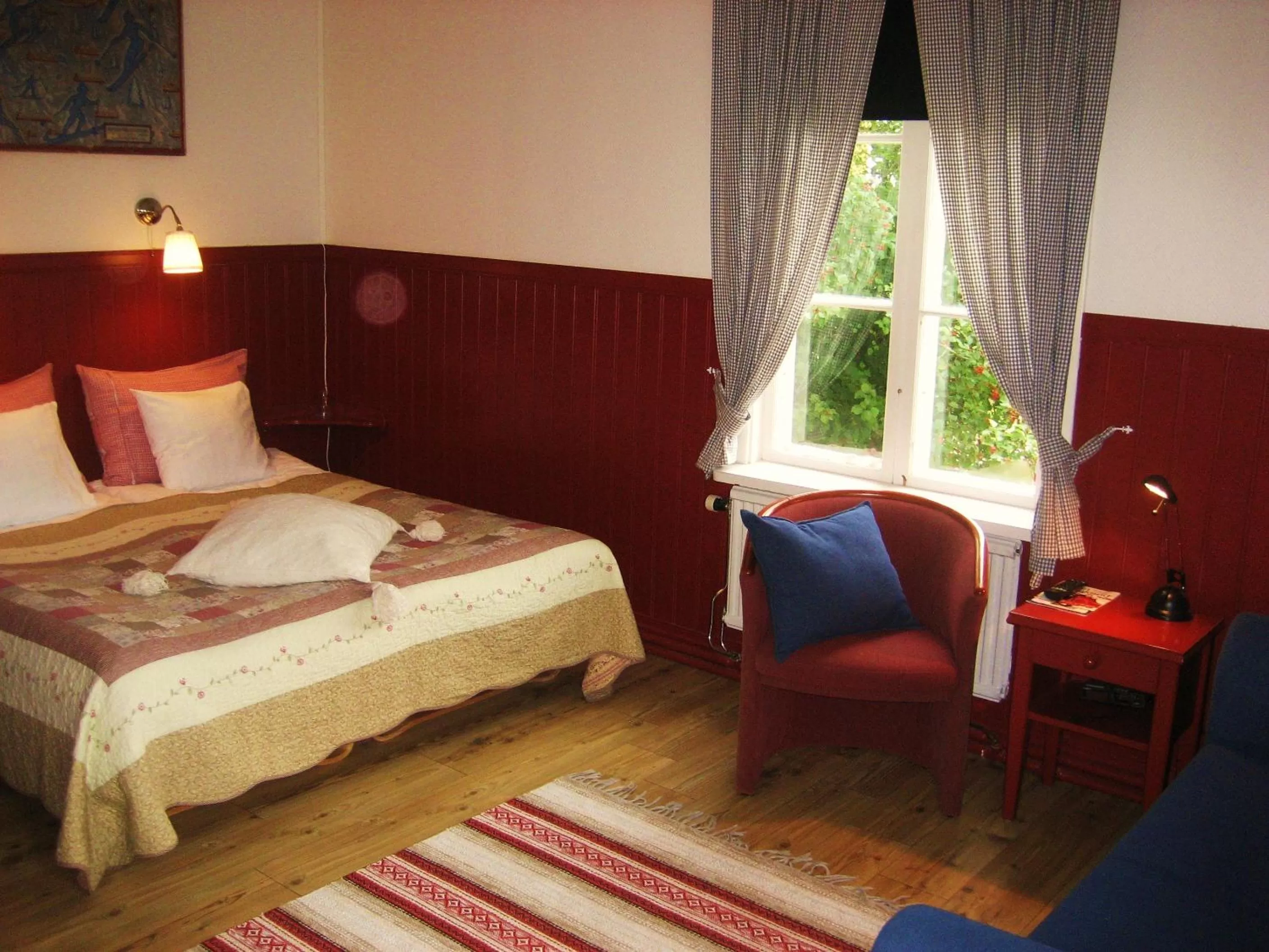 Photo of the whole room, Bed in Värdshuset Lugnet