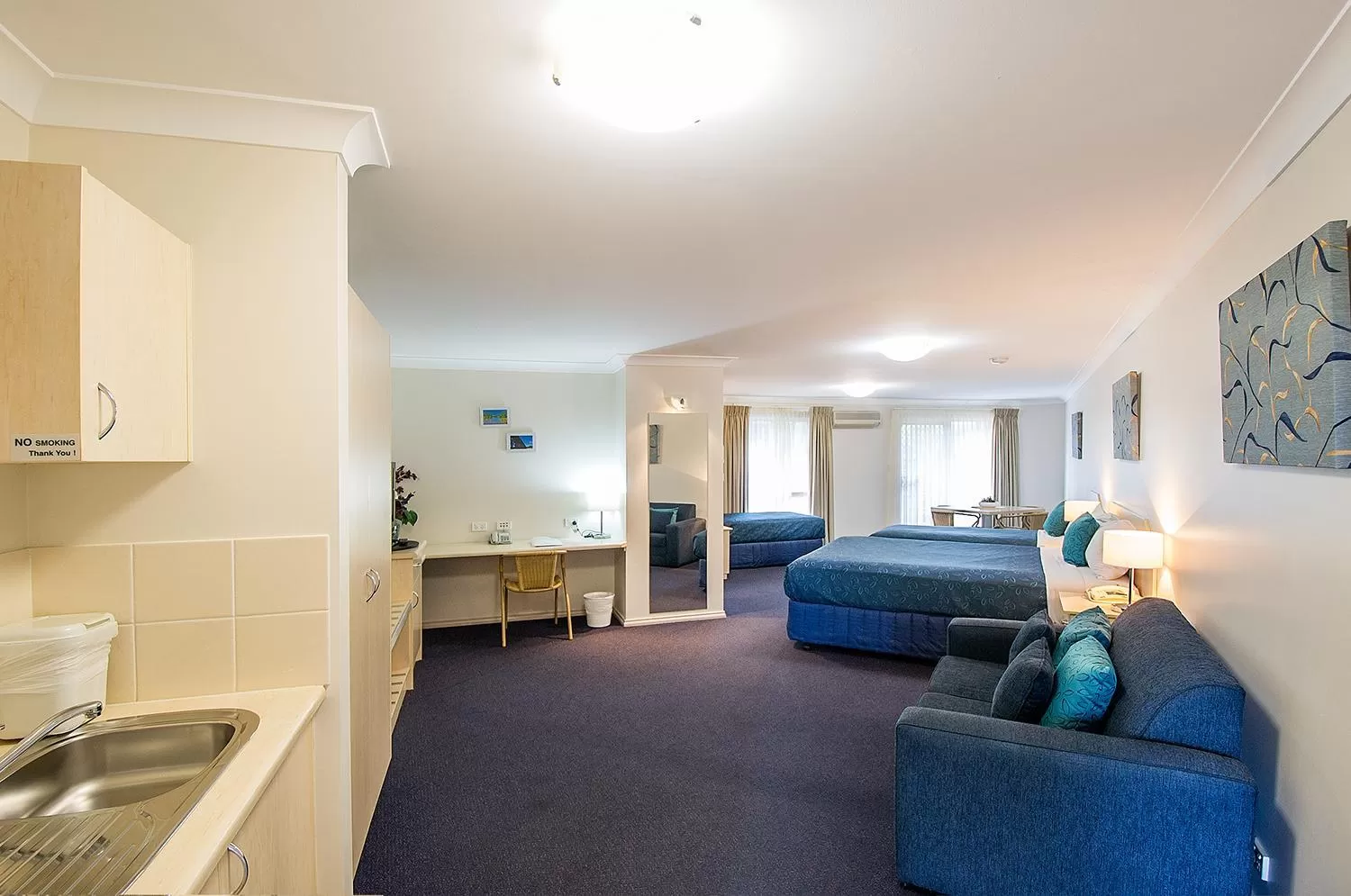 Bed in Tuckerbox Motor Inn