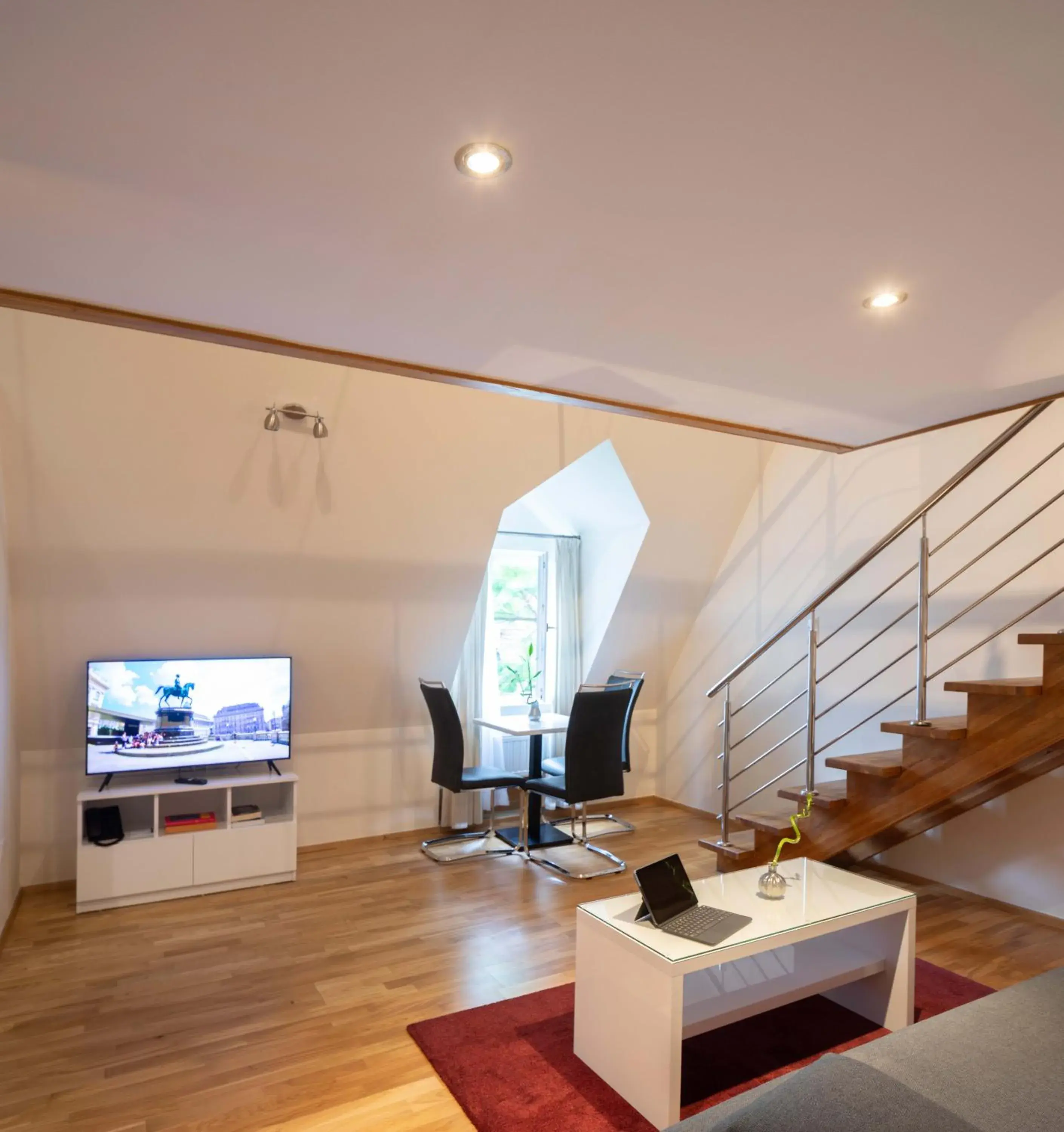 Living room, TV/Entertainment Center in The Levante Rathaus Apartments