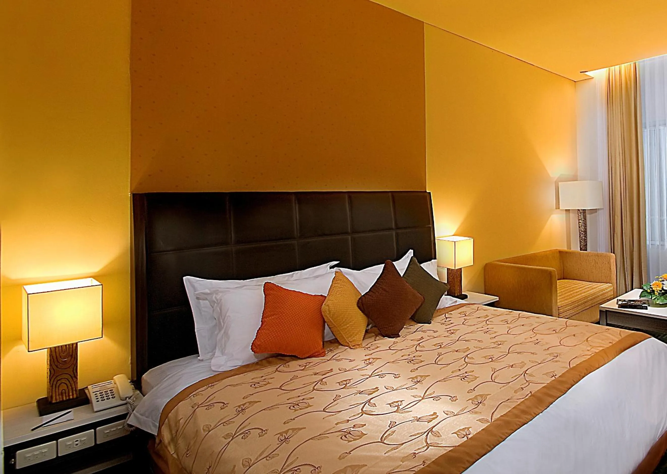 Photo of the whole room, Bed in Golden Flower by KAGUM Hotels