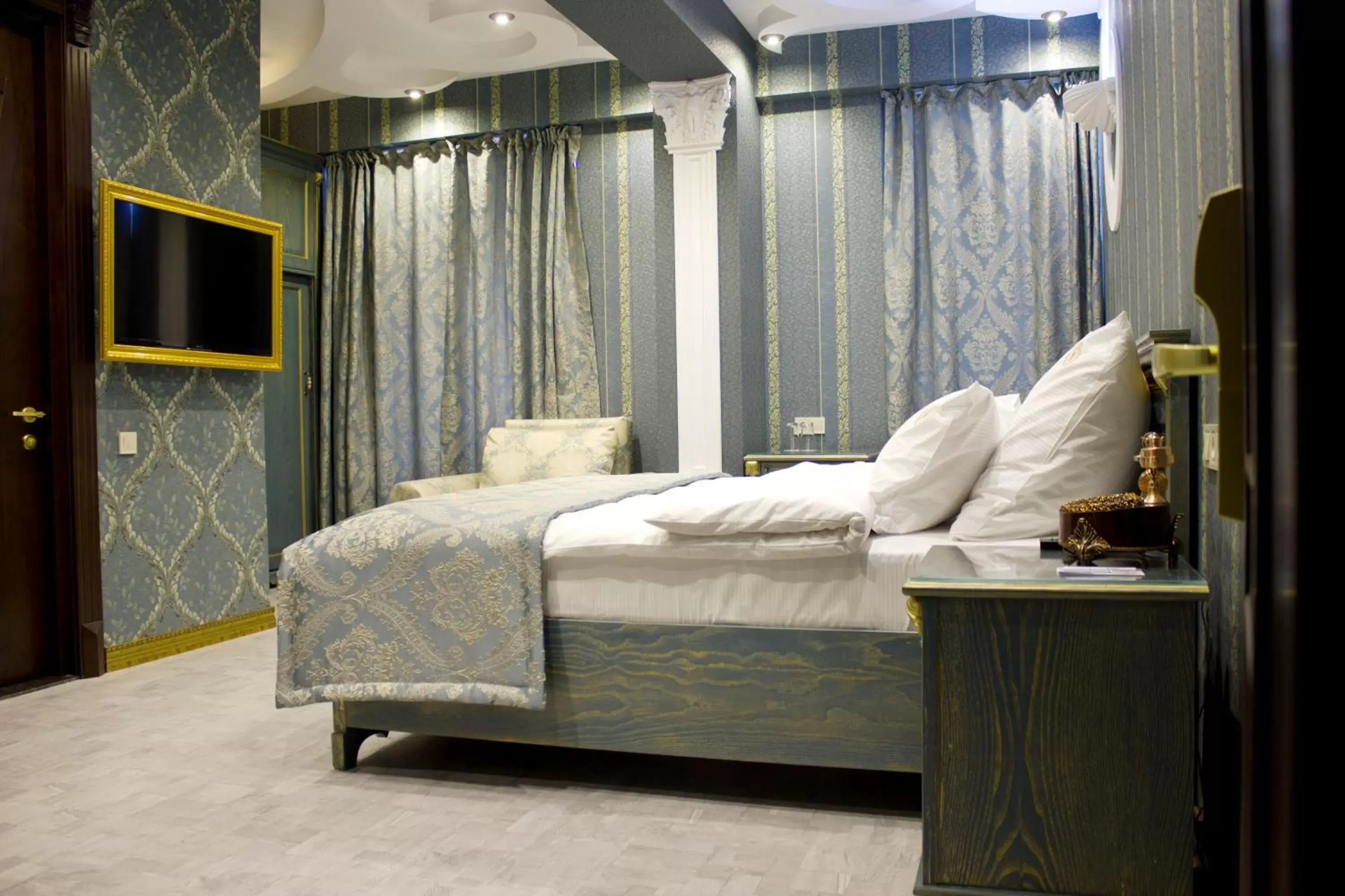 Photo of the whole room, Bed in Neapol Boutique Hotel Photo of the whole room, Bed in Neapol Boutique Hotel