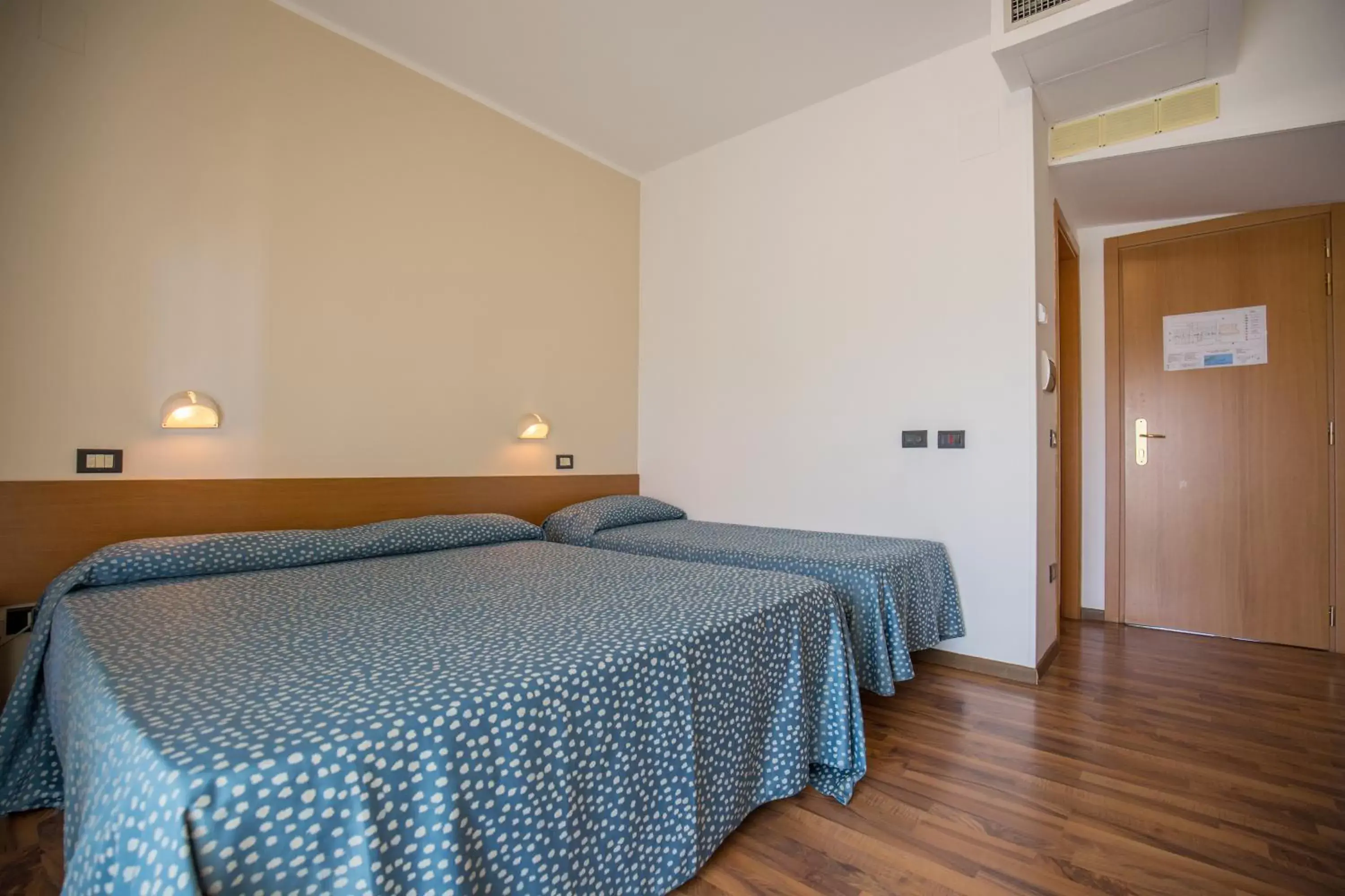 Bed in Hotel L'Aragosta