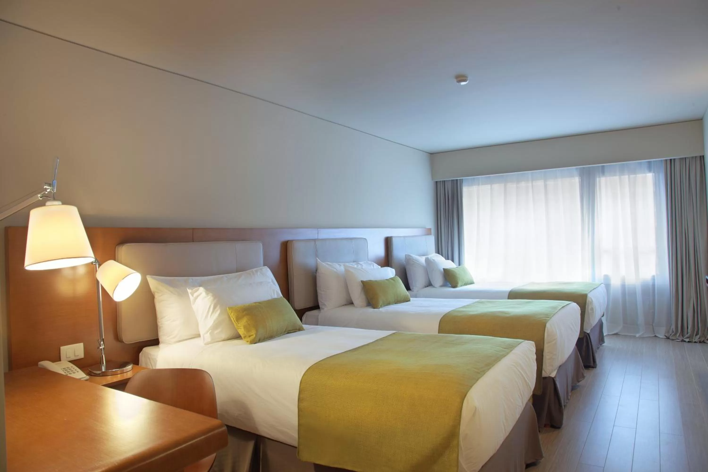 Bed in Dazzler by Wyndham Montevideo