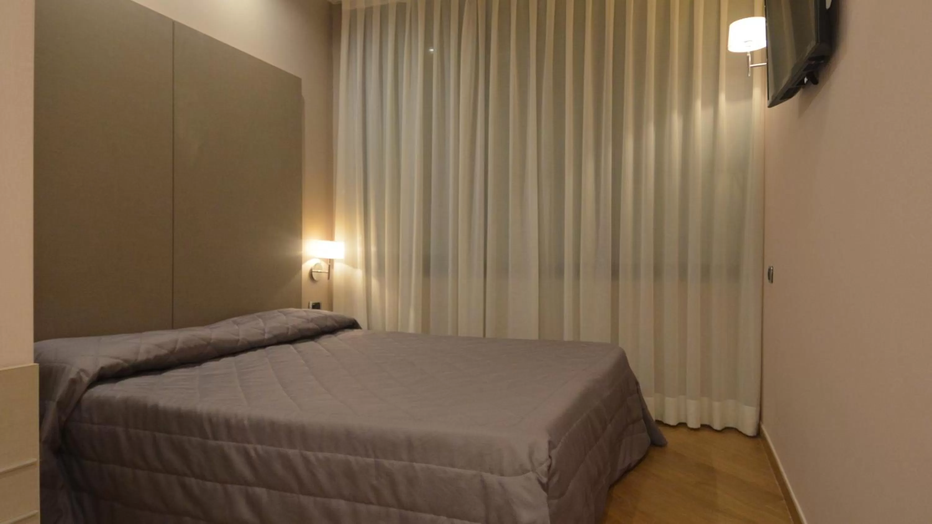 People, Bed in Magri's Hotel