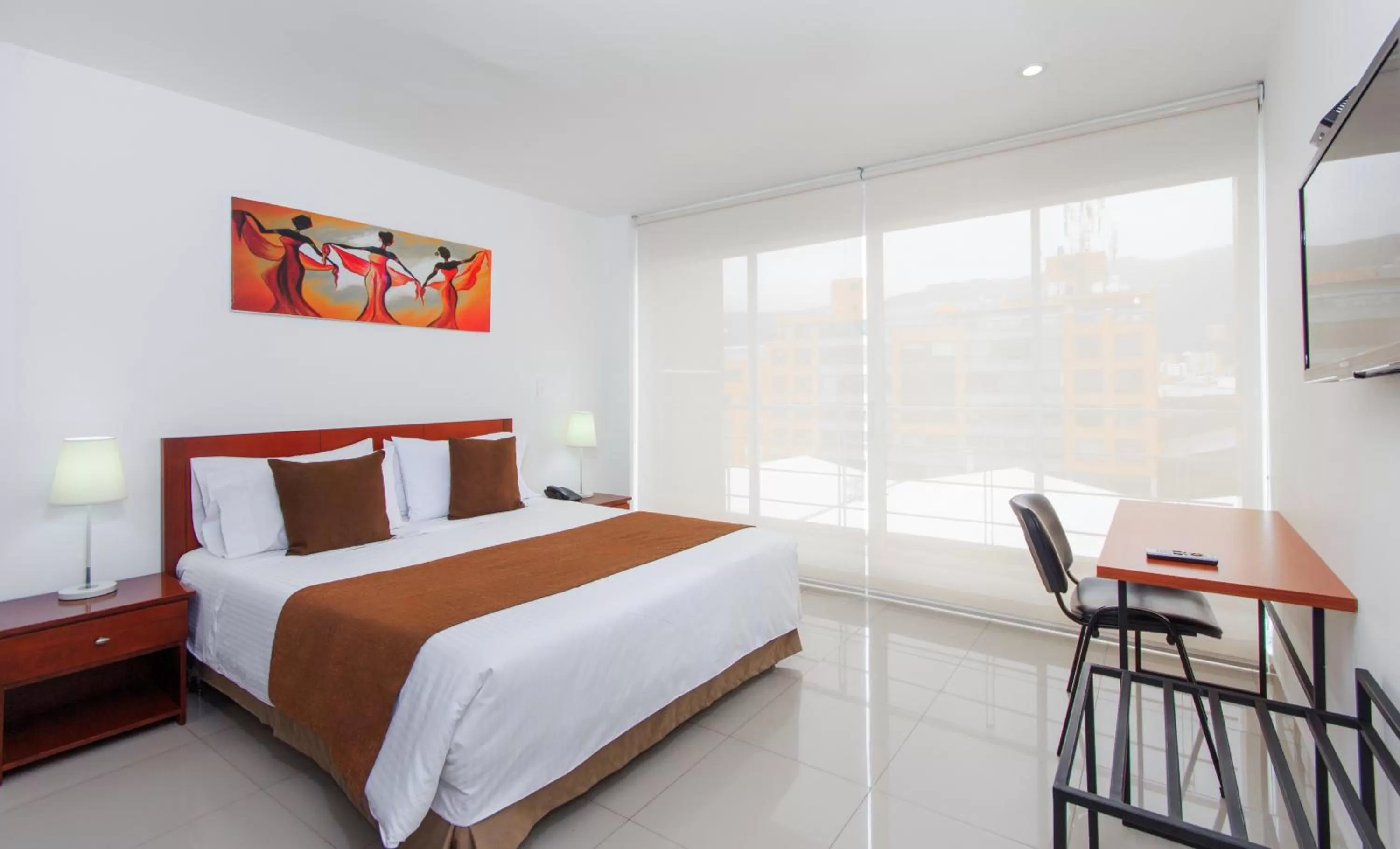 Bed in 122 Plaza Apartahotel