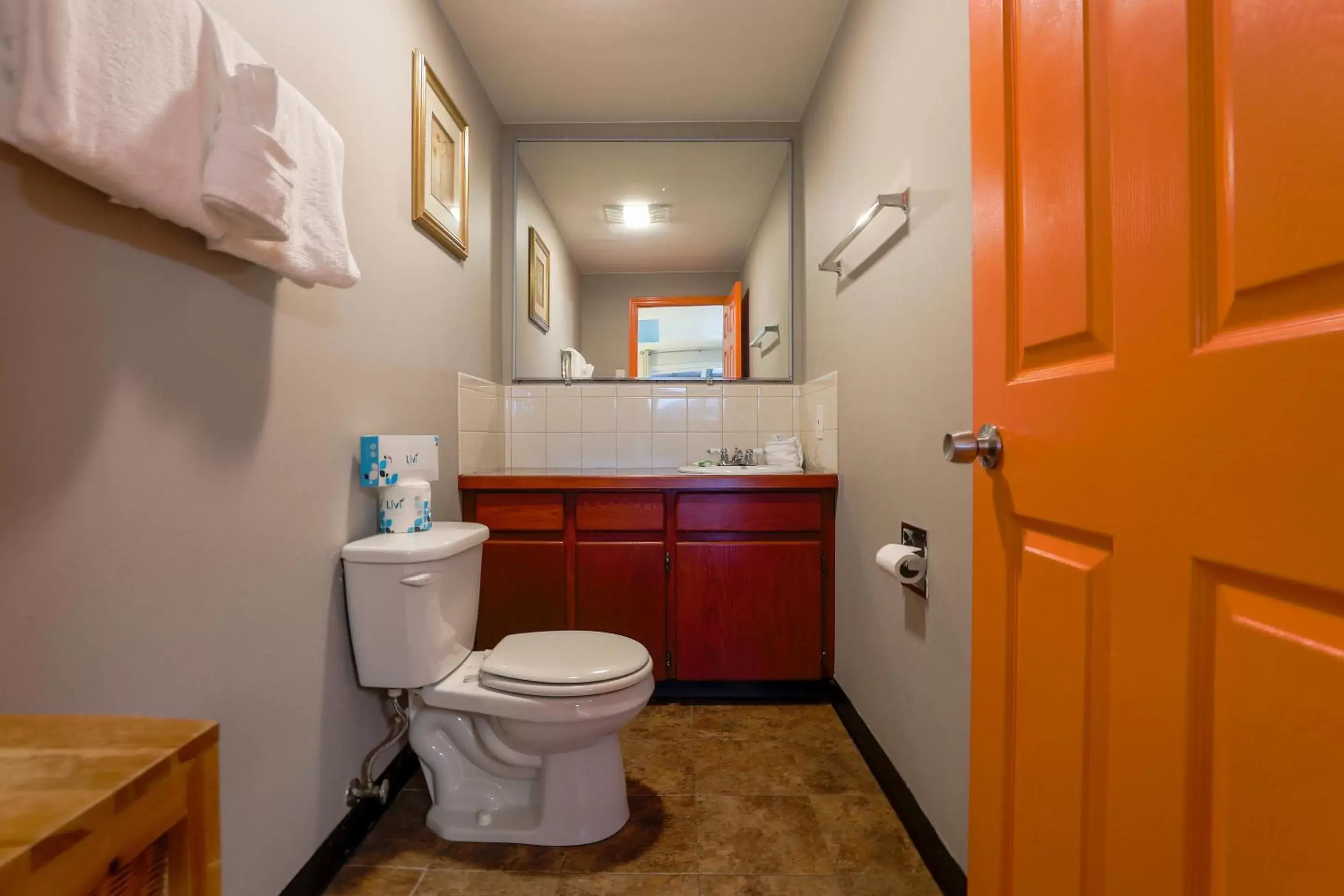 Bathroom in Coast River Inn by OYO Seaside