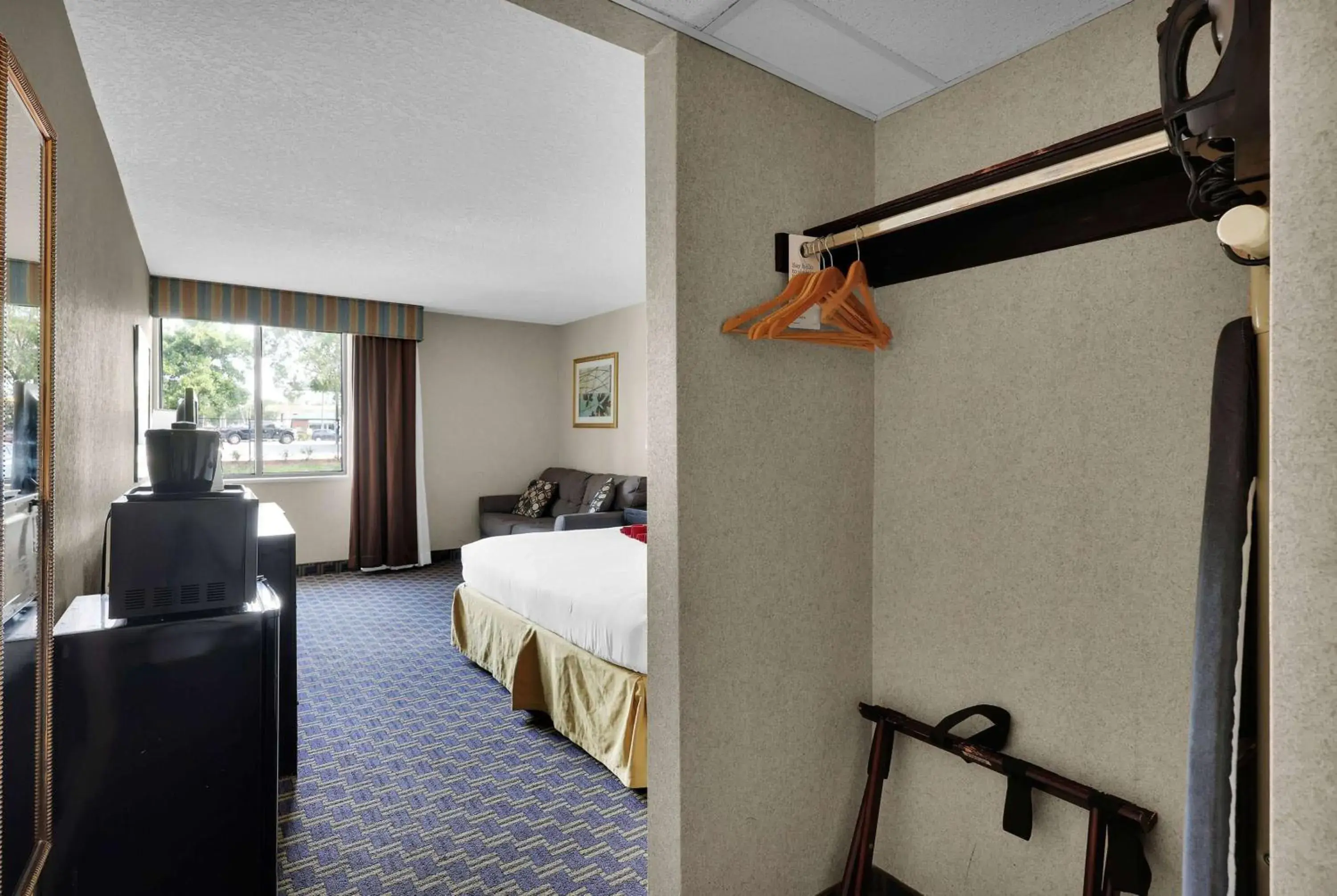 Photo of the whole room, Bed in Ramada by Wyndham Jacksonville I-95 by Butler Blvd