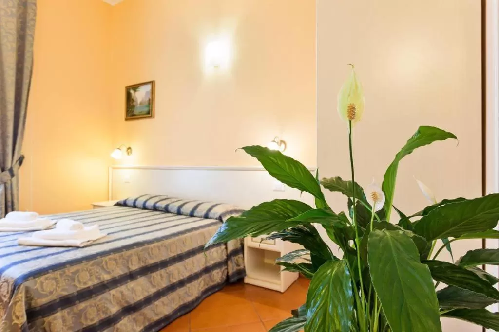 Photo of the whole room, Bed in Vatican Town