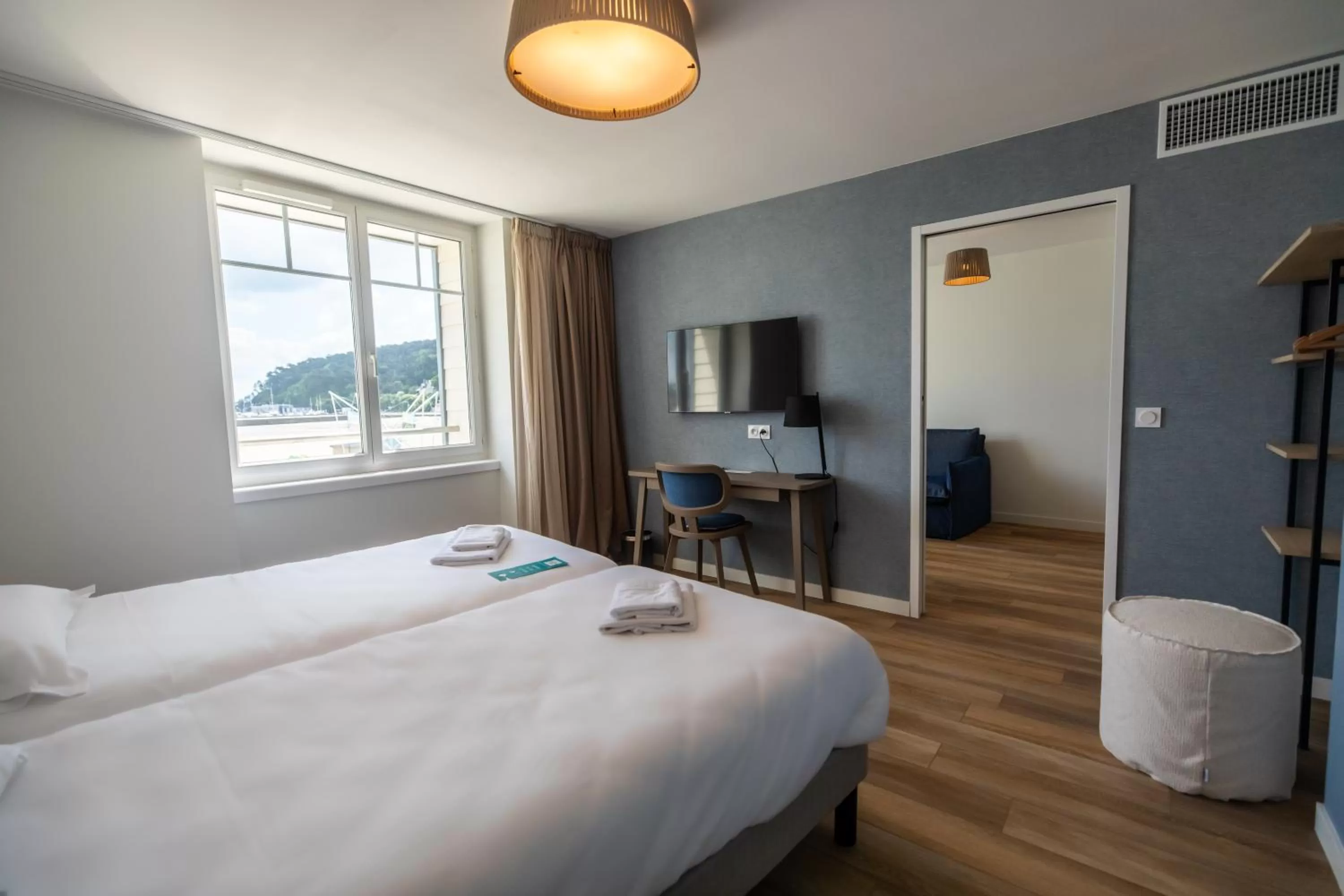 Bed in Hôtel de la Baie