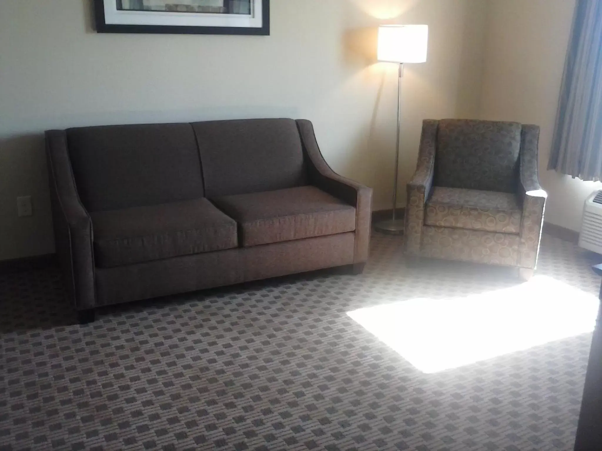 Living room, Seating Area in Cobblestone Inn & Suites - Avoca