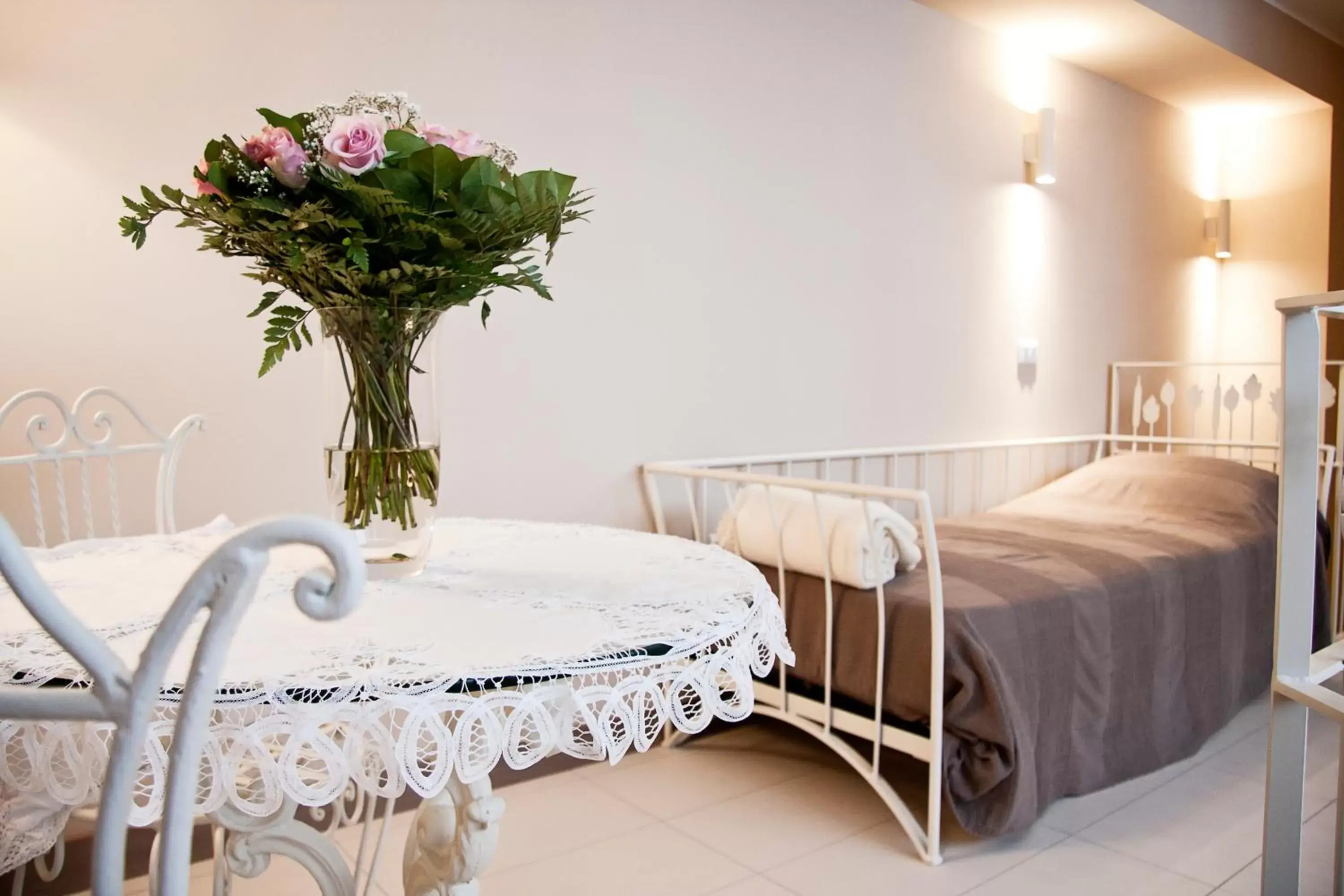 Bed, Dining Area in La Castellana Loft Hotel