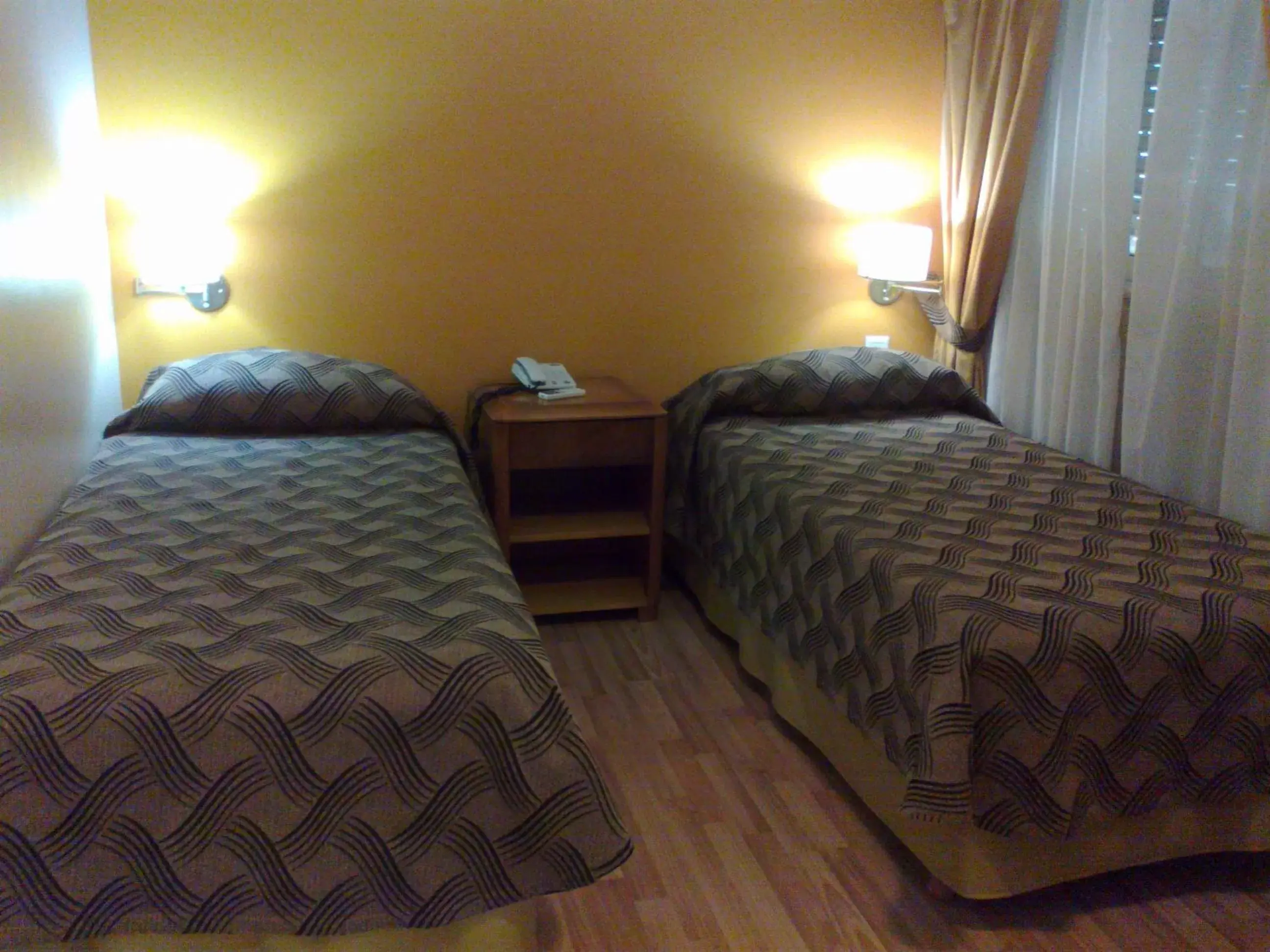 Bedroom, Bed in Tritone Hotel